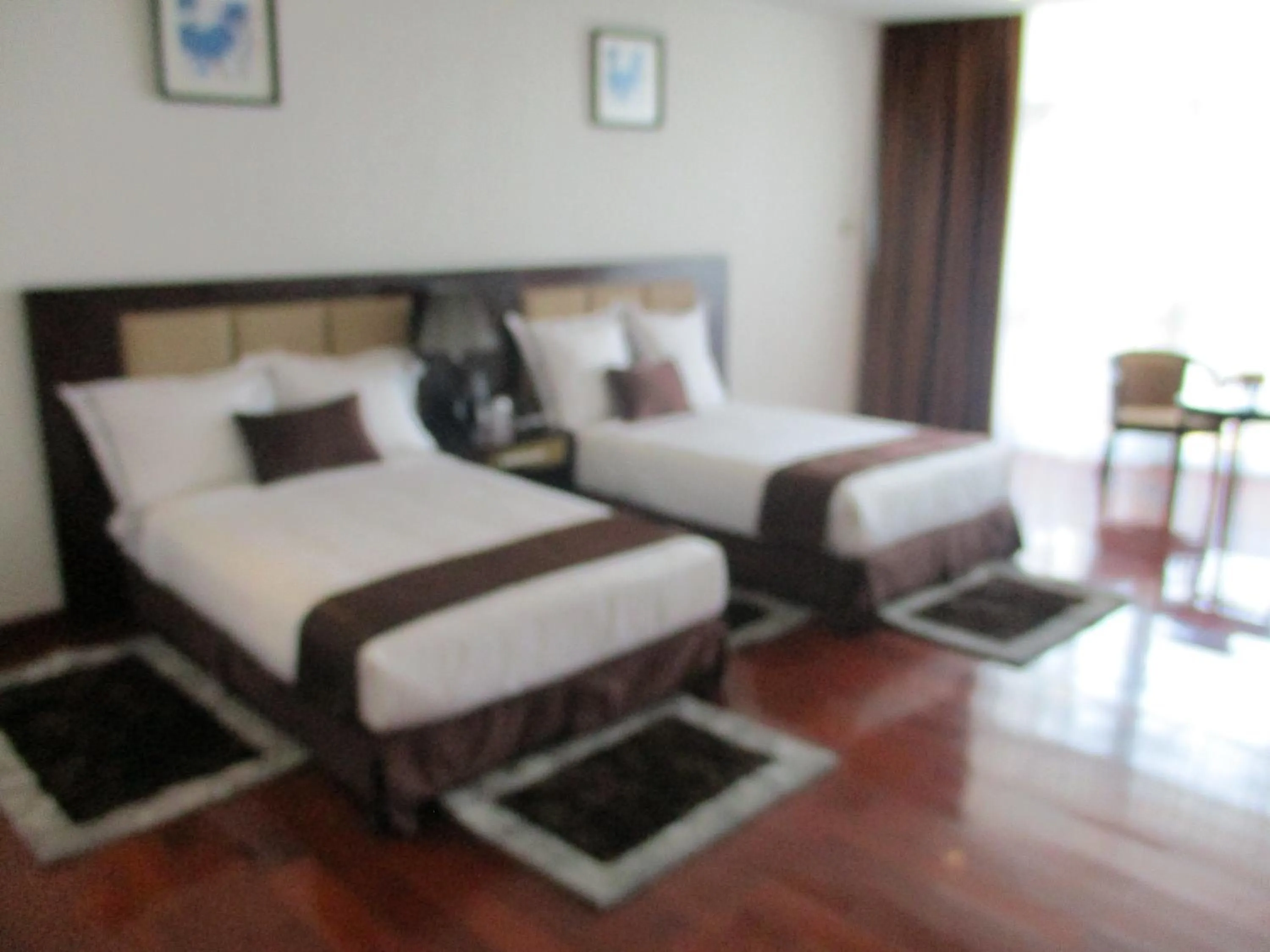 Photo of the whole room, Bed in Grand Eliana Hotel Conference & Spa