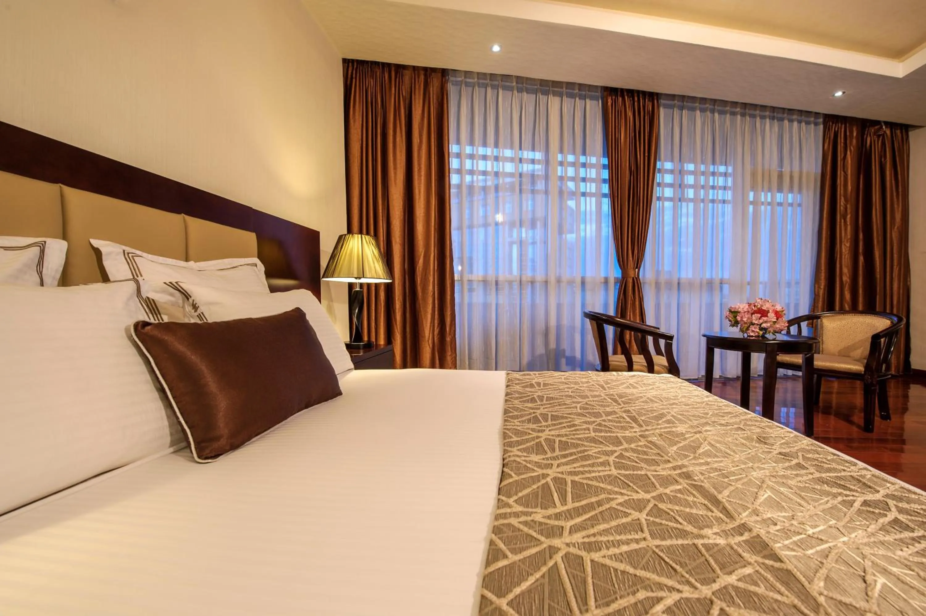 Bed in Grand Eliana Hotel Conference & Spa