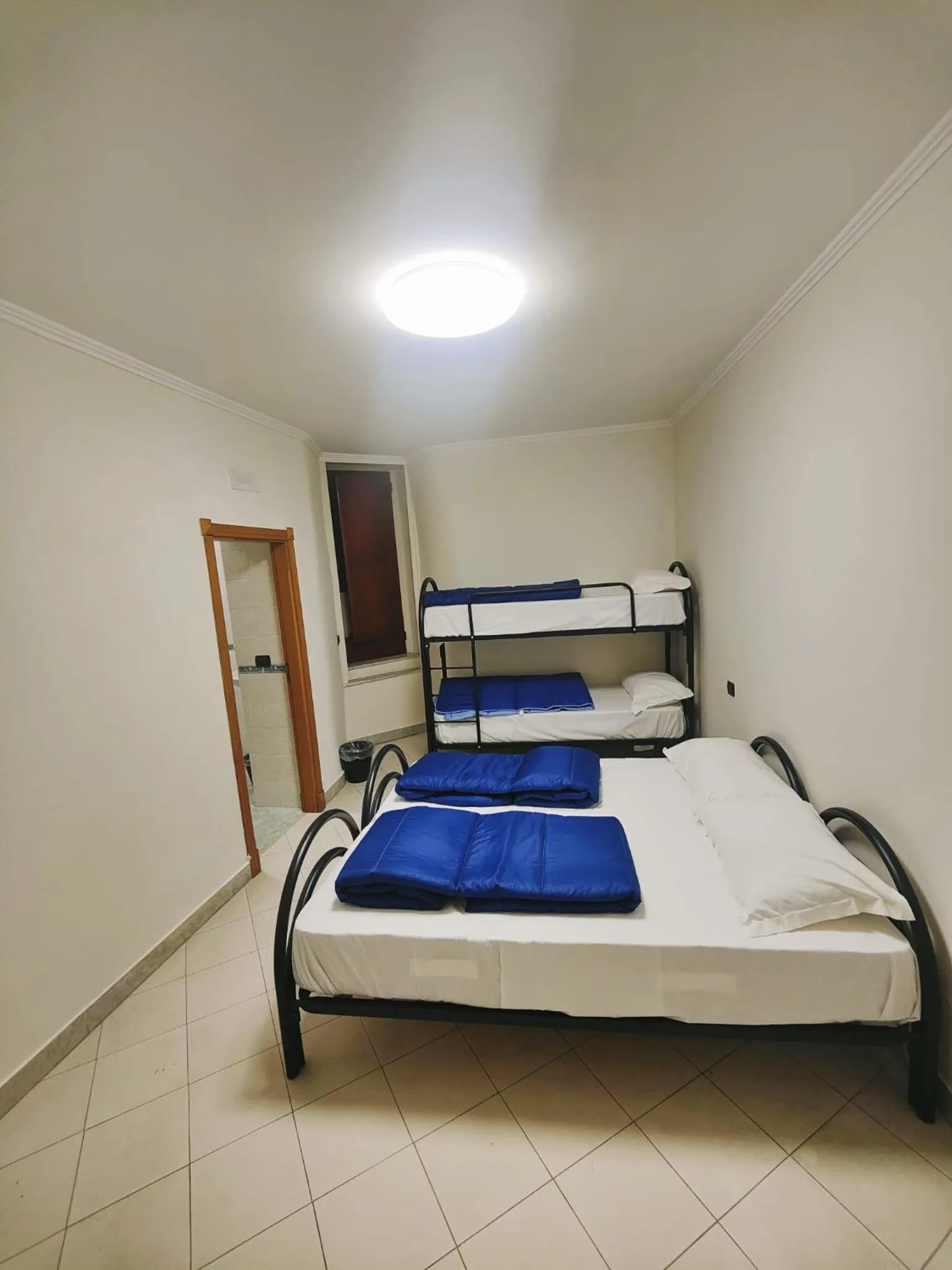 Bedroom in Backpacker Naples