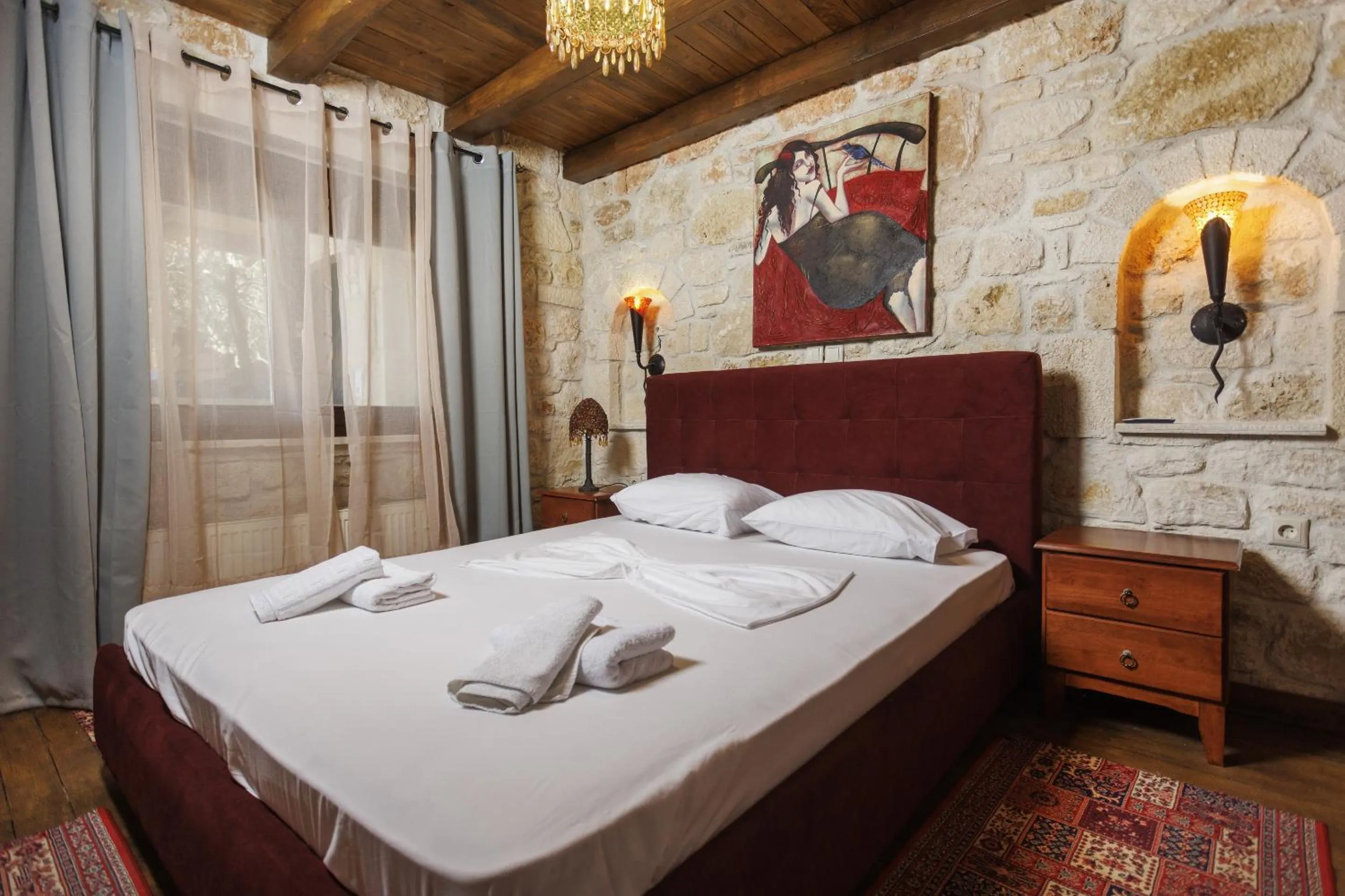 Bedroom in Akritas Ef Zin Villas & Suites