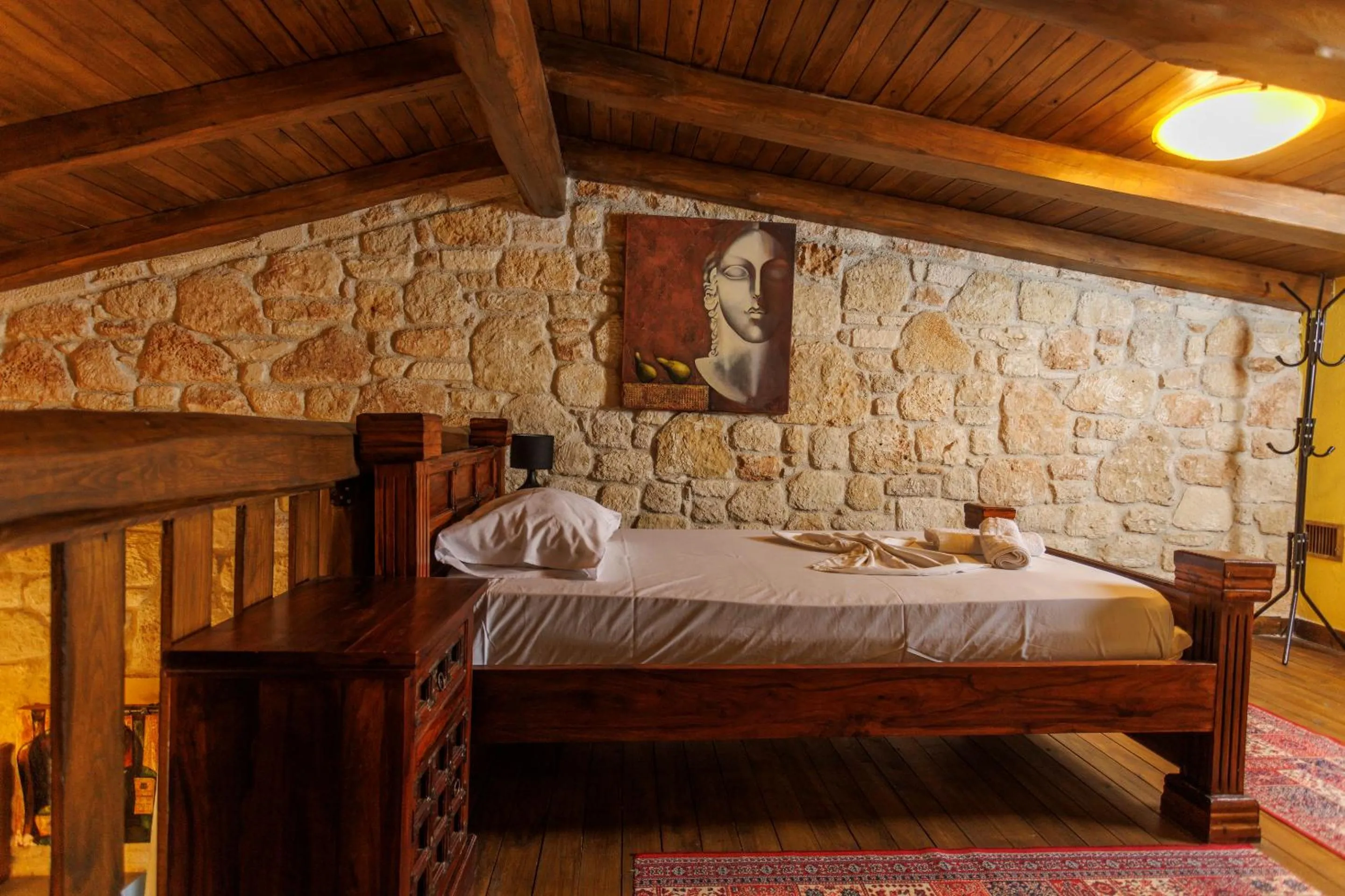 Bedroom in Akritas Ef Zin Villas & Suites