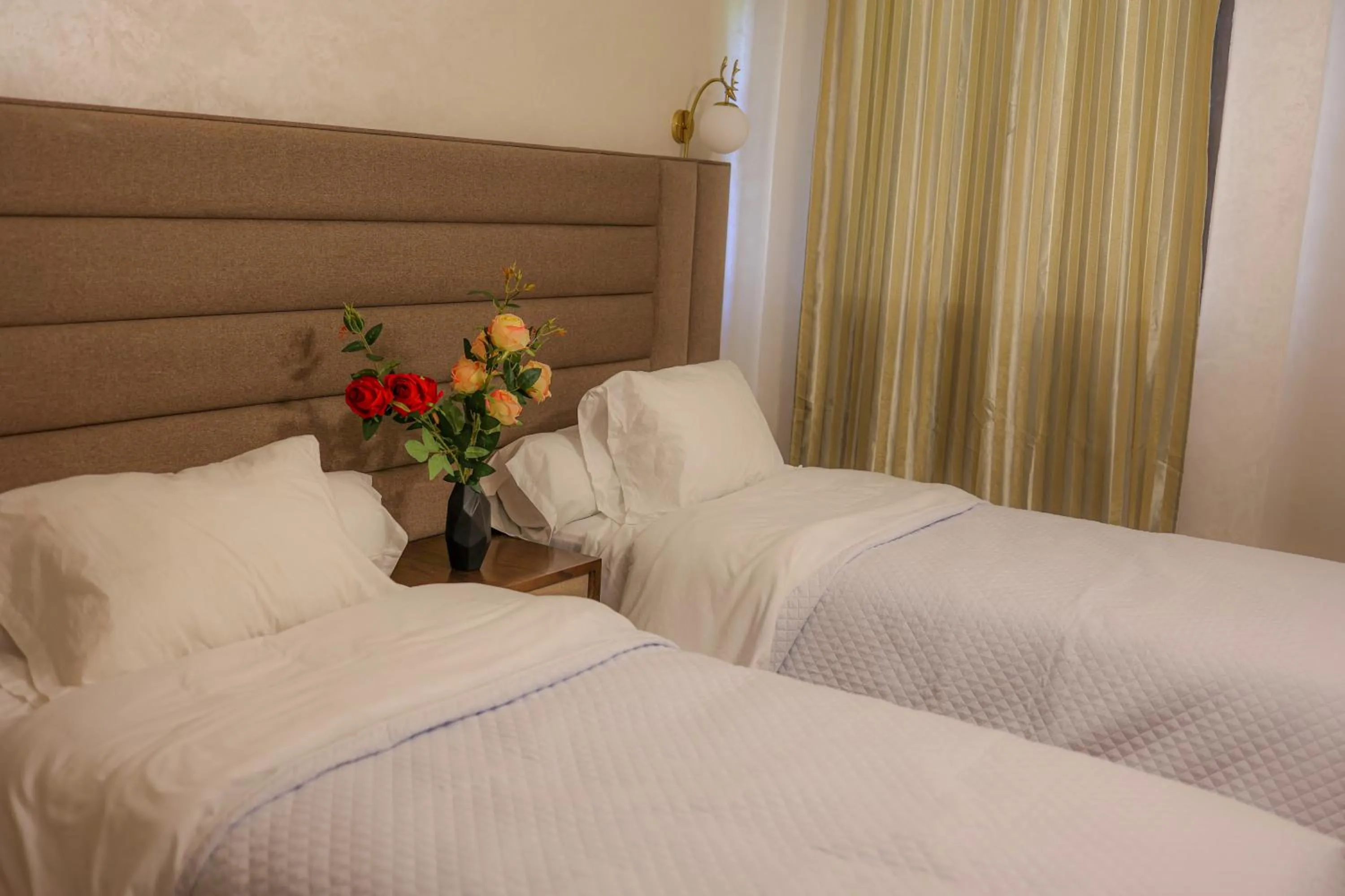 Bed in Hôtel Des Lilas