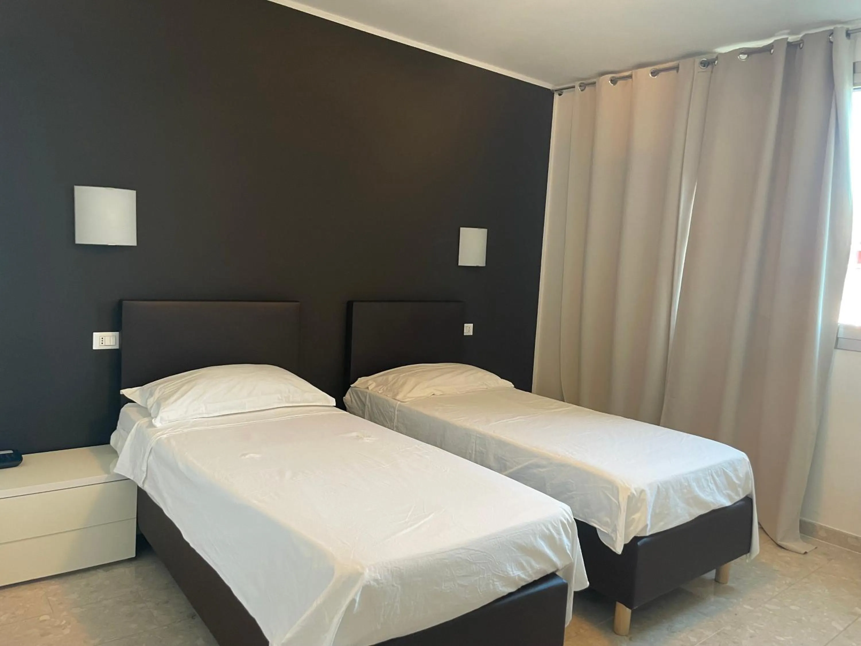 Bed in Hotel Noventa