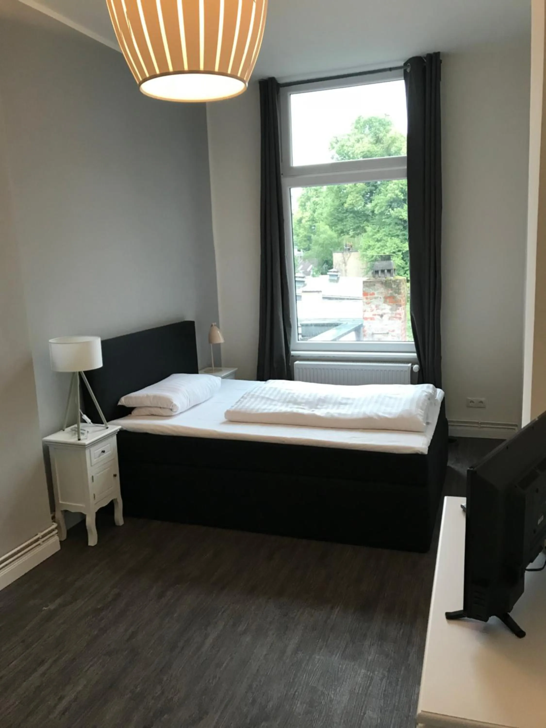 Bed in Hotel Fame am Hauptbahnhof