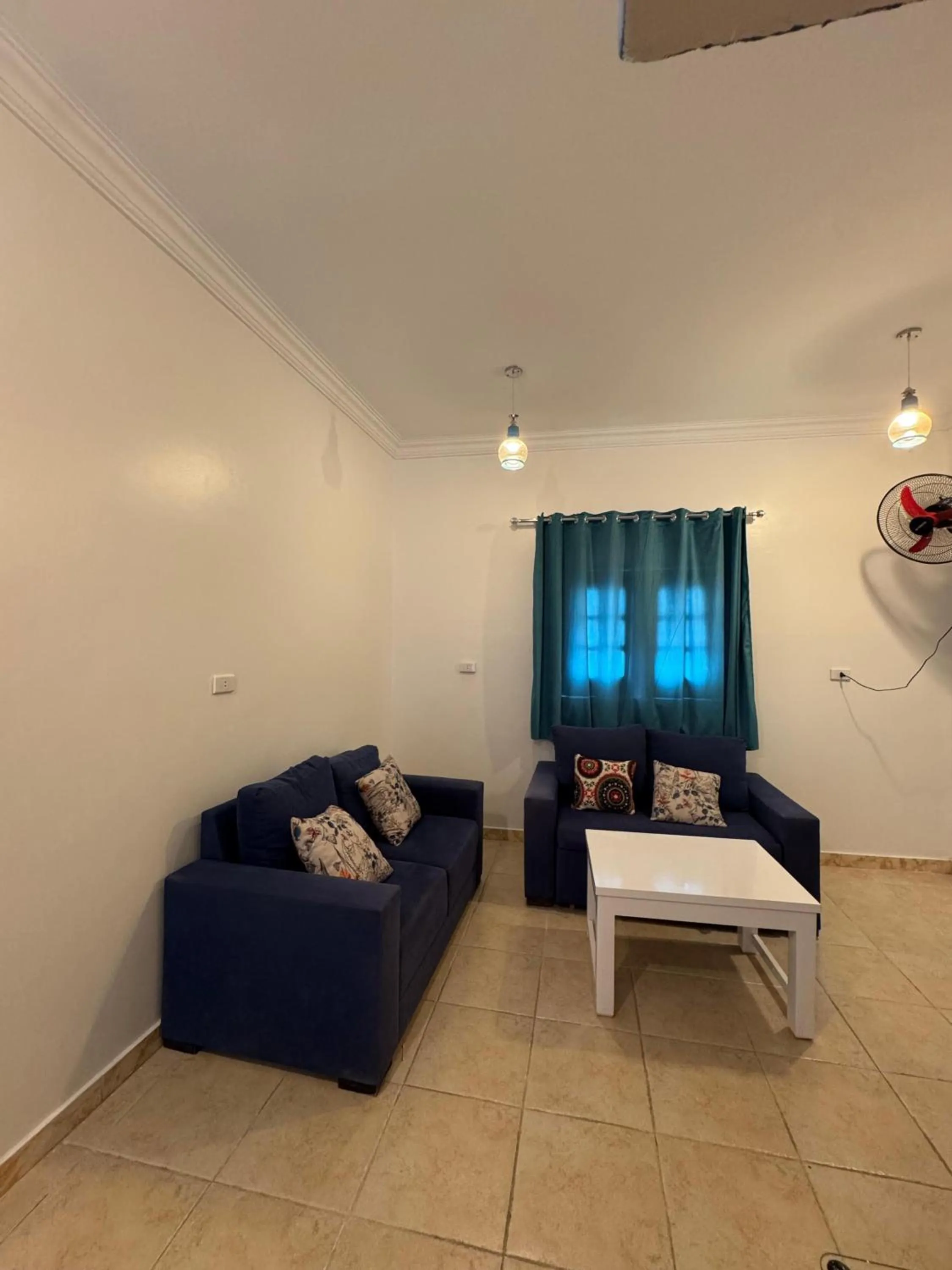 Living room, Bed in Luxor Guest House