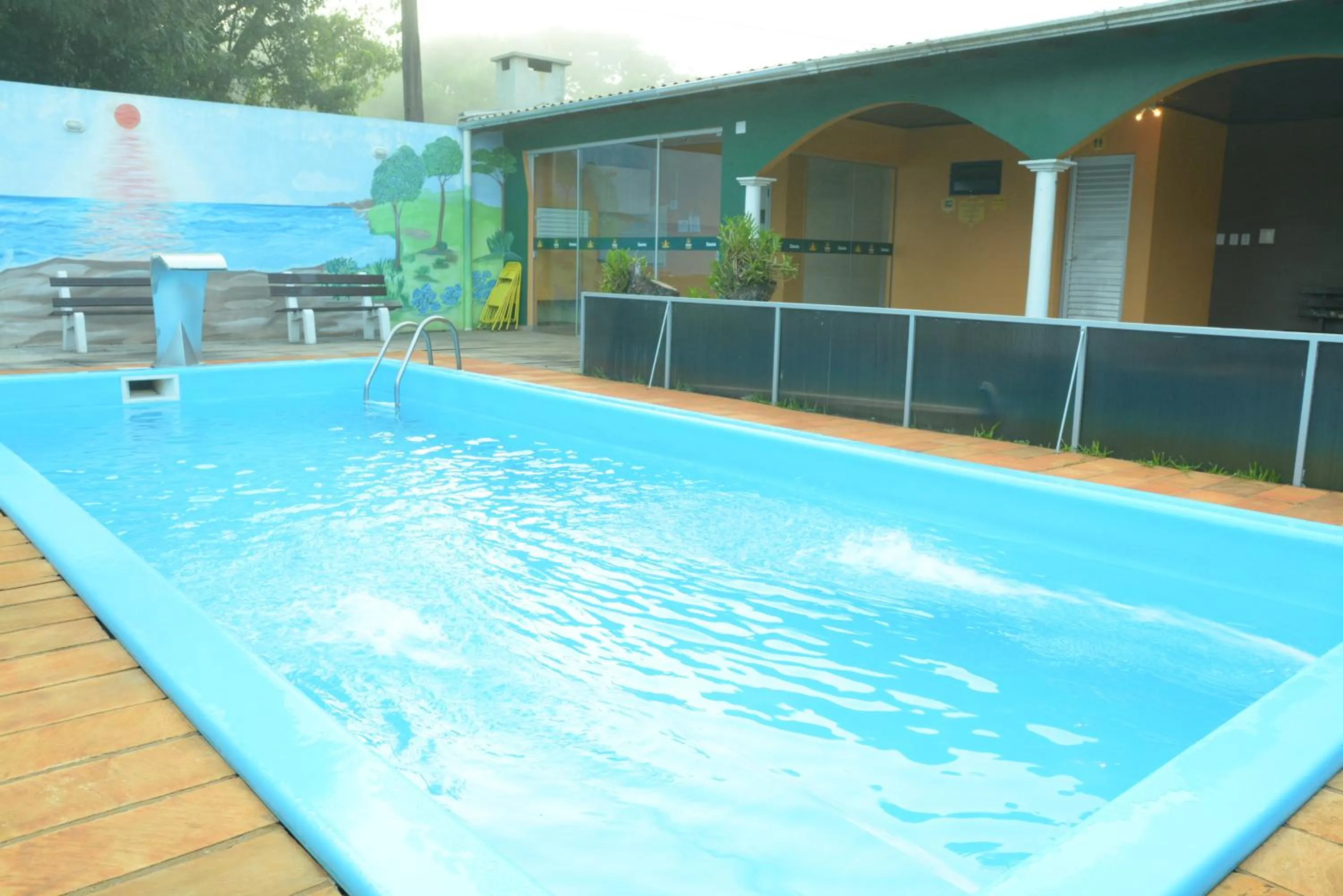 Swimming pool in Hotel Nossa Casa