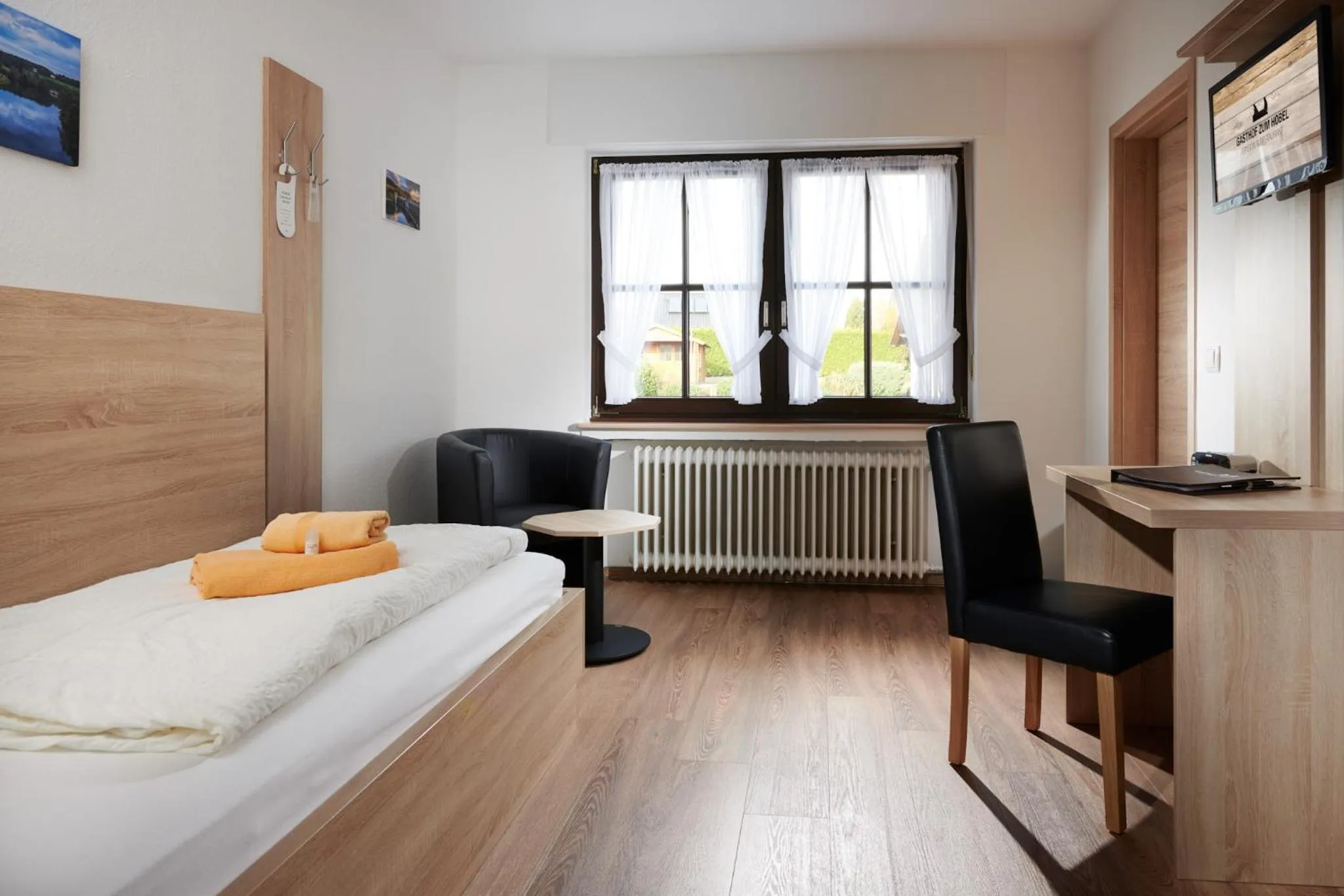 Photo of the whole room, Bed in Gasthof Zum Hobel