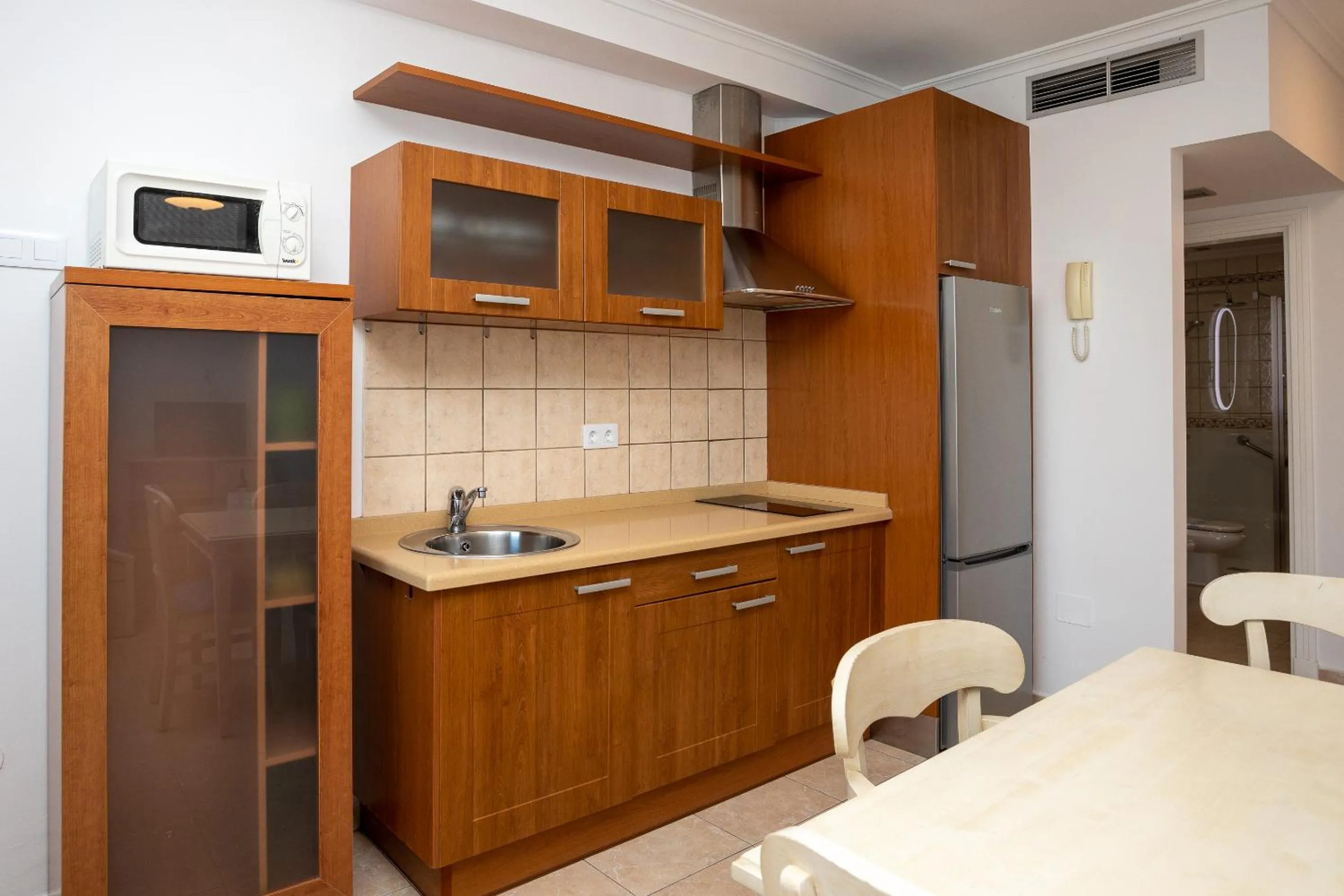 Kitchen or kitchenette in Villamar Hotel