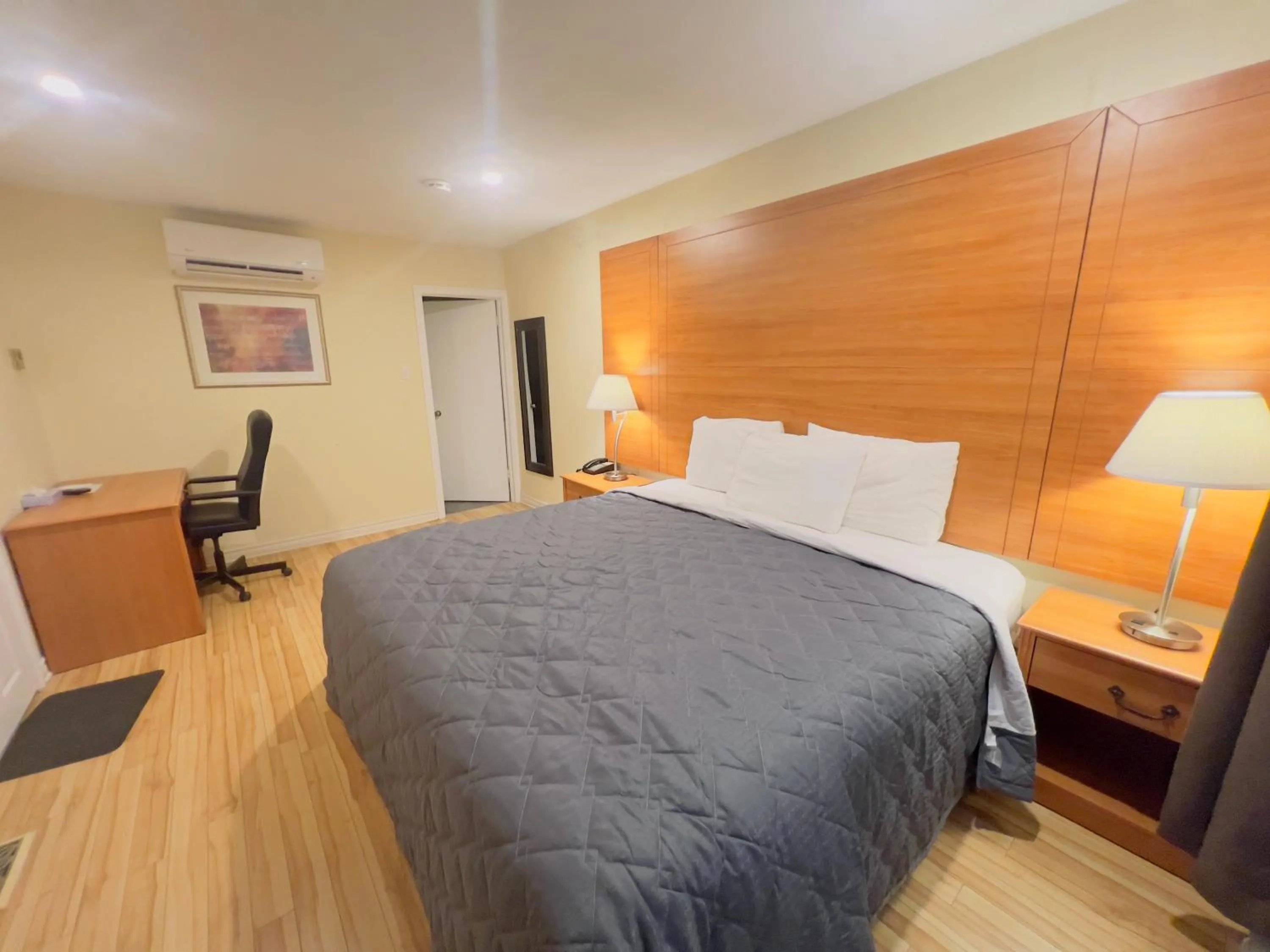 Bed in First Canada Hotel Cornwall Hwy 401 ON