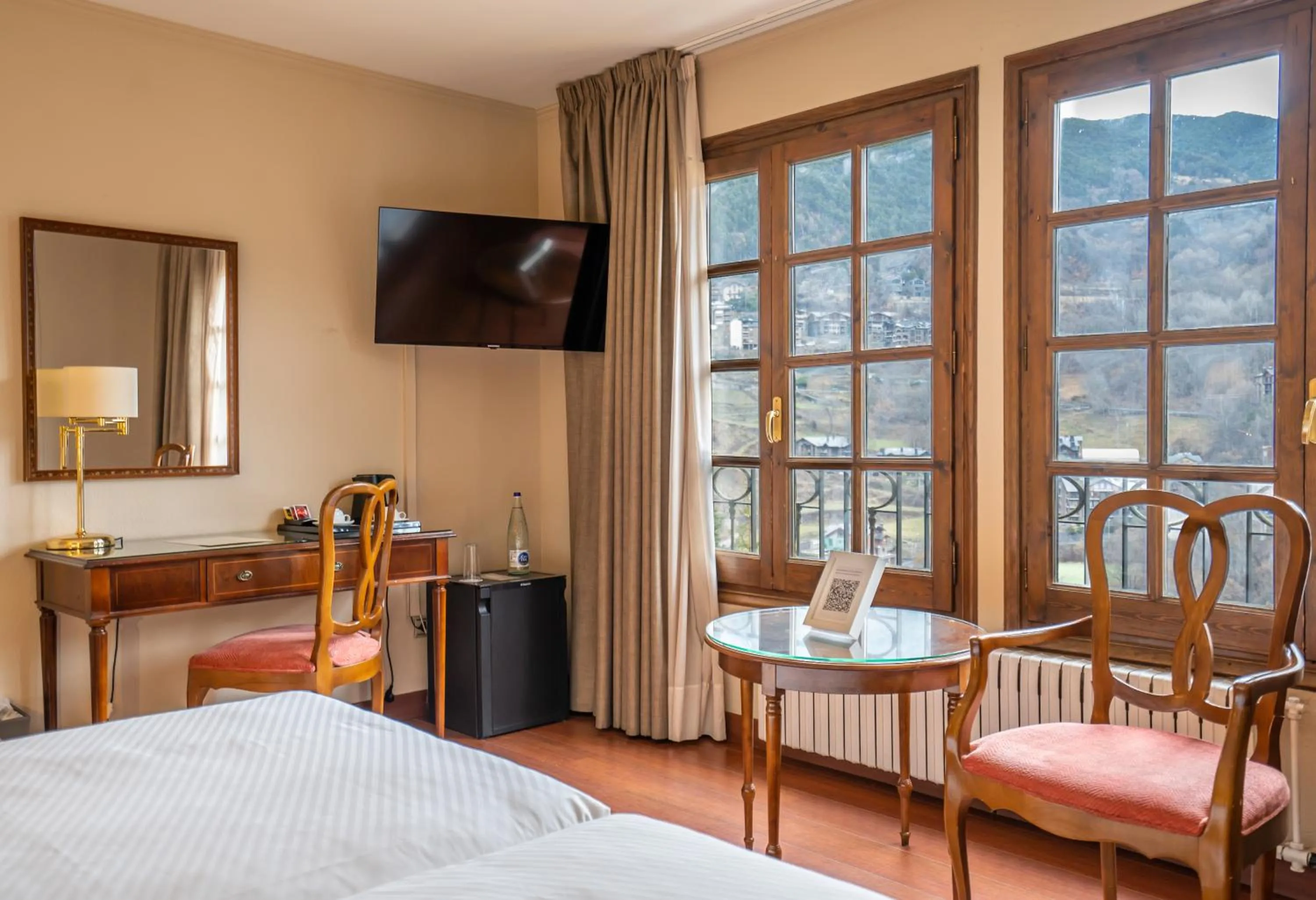 Seating area, Bed in Abba Xalet Suites Hotel