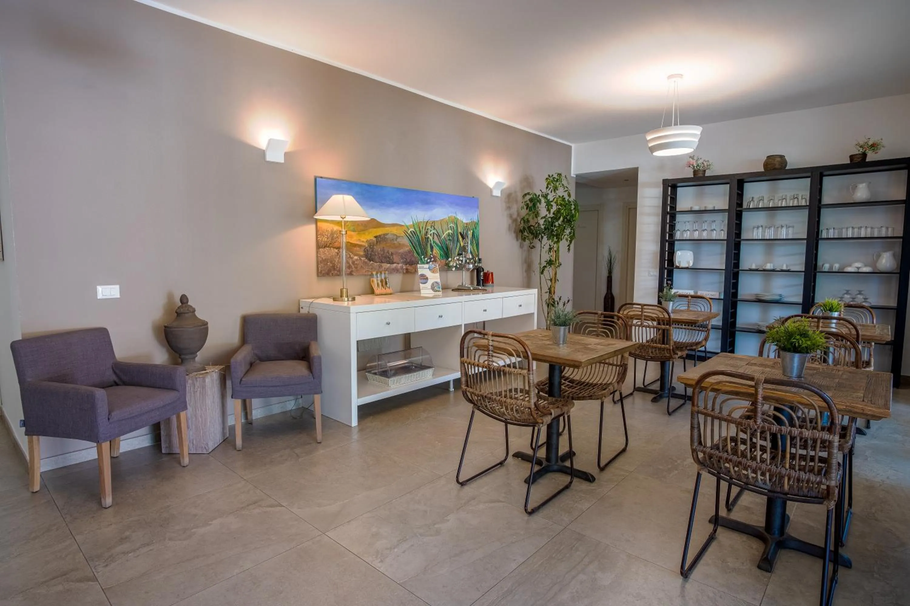 Communal lounge/ TV room in Le Muse Mondello