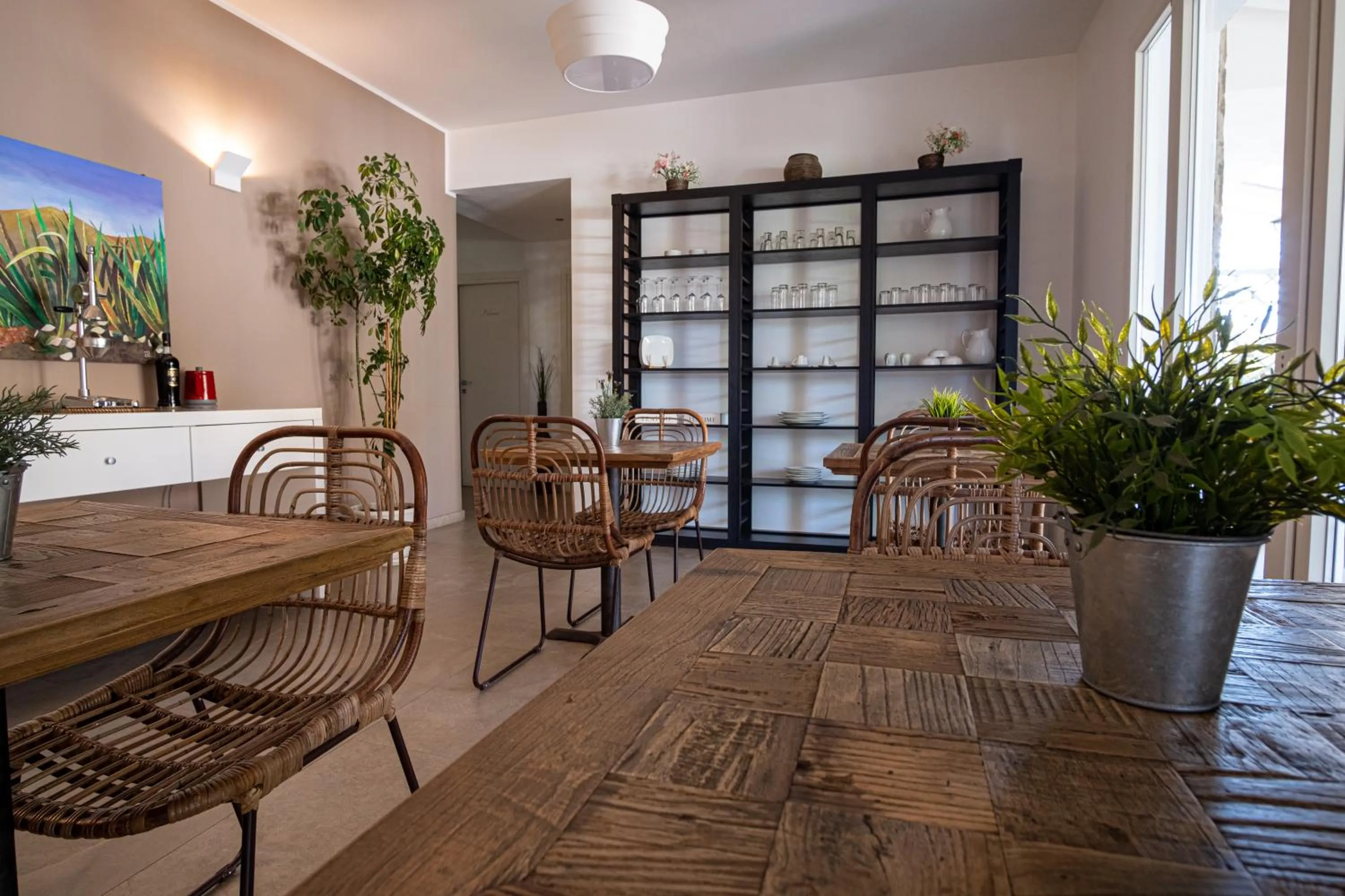 Communal lounge/ TV room in Le Muse Mondello