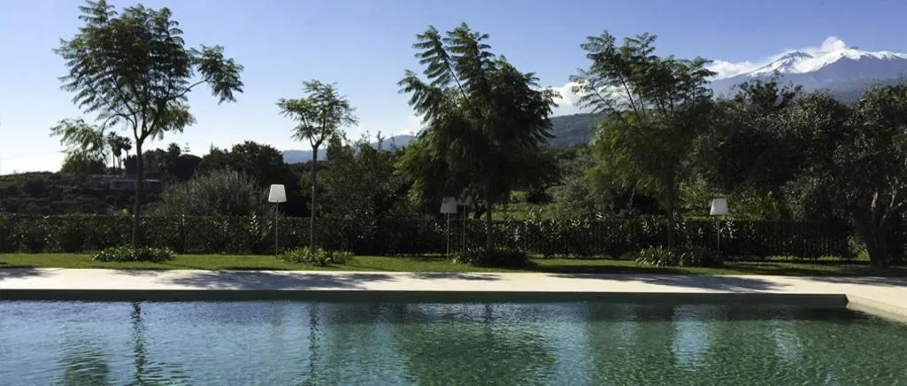 Swimming pool in Talè Restaurant & Suite