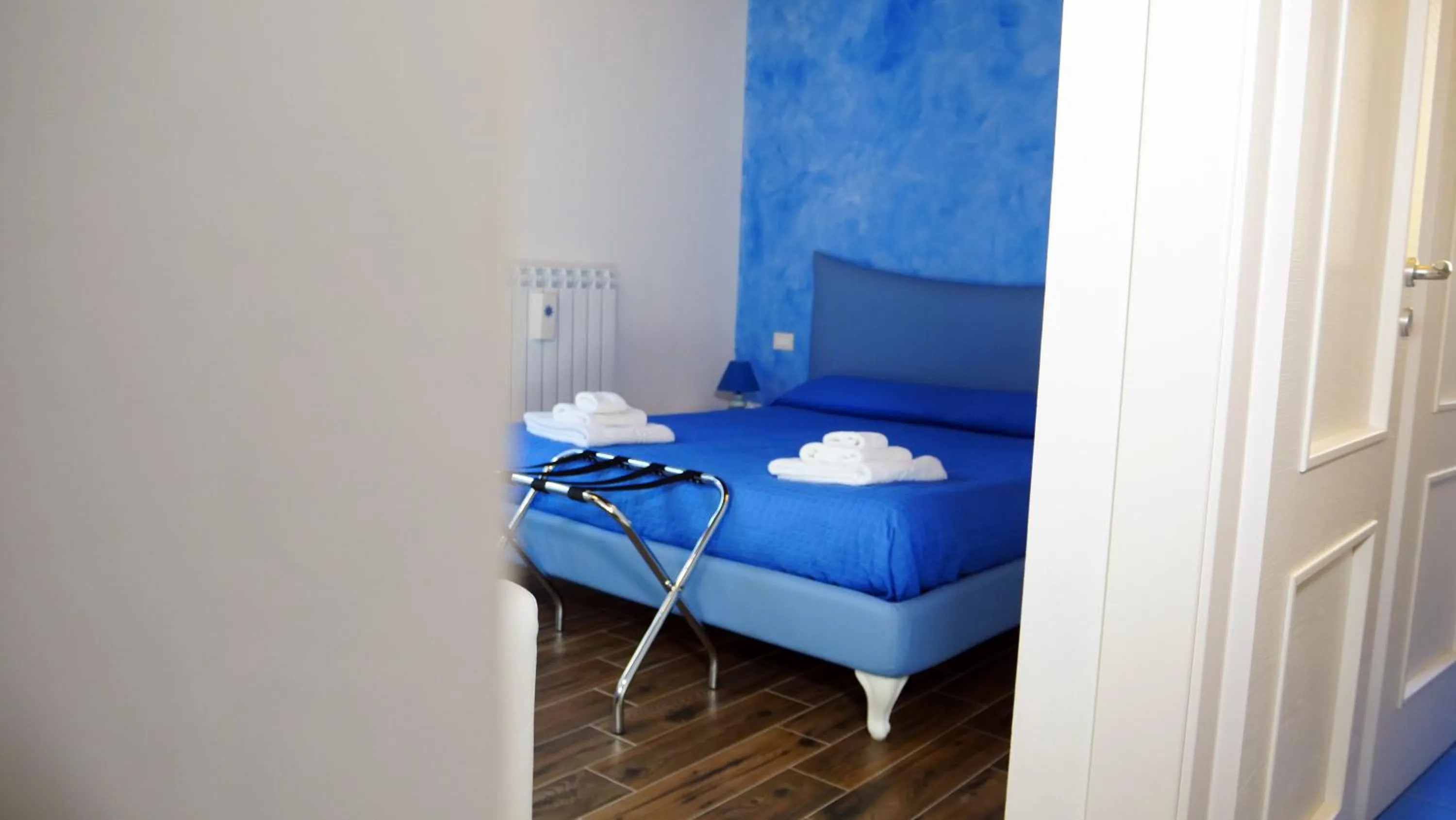 Decorative detail, Bed in Antico Borgo San Francesco