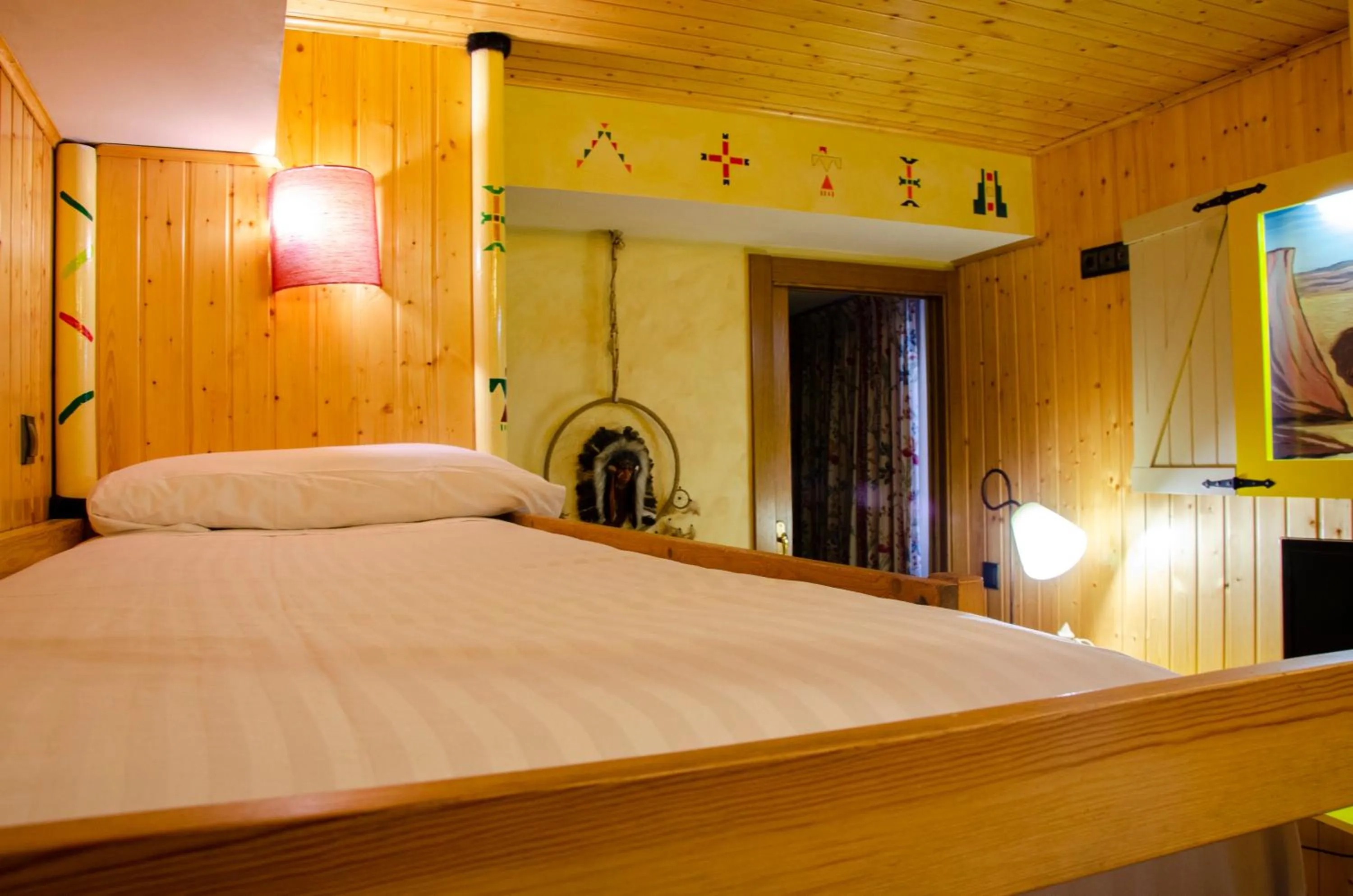 Bed in Ski Plaza Hotel & Wellness