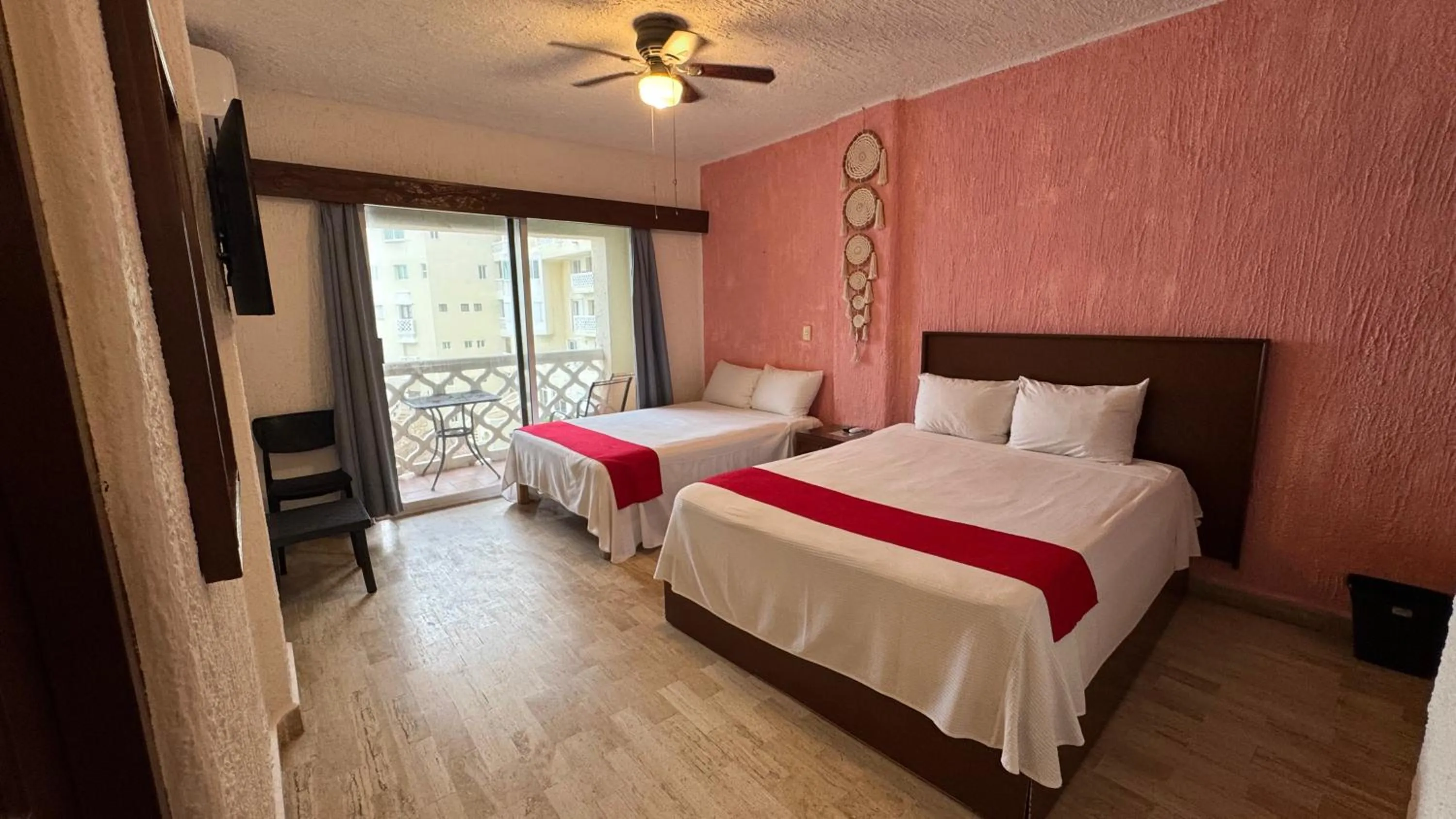 Bed in Cancún Plaza Sea View