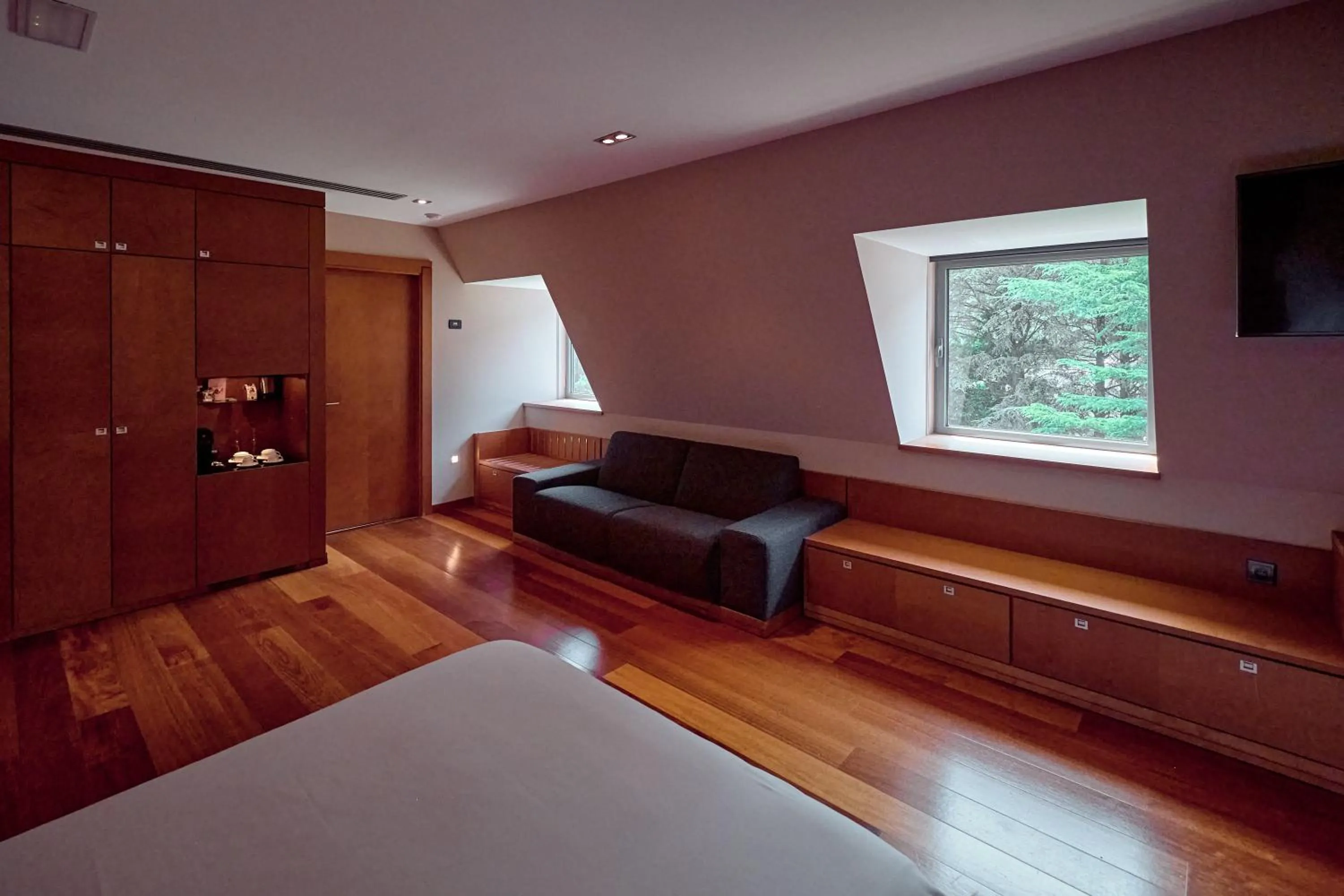 Living room, Bed in Andorra Park Hotel