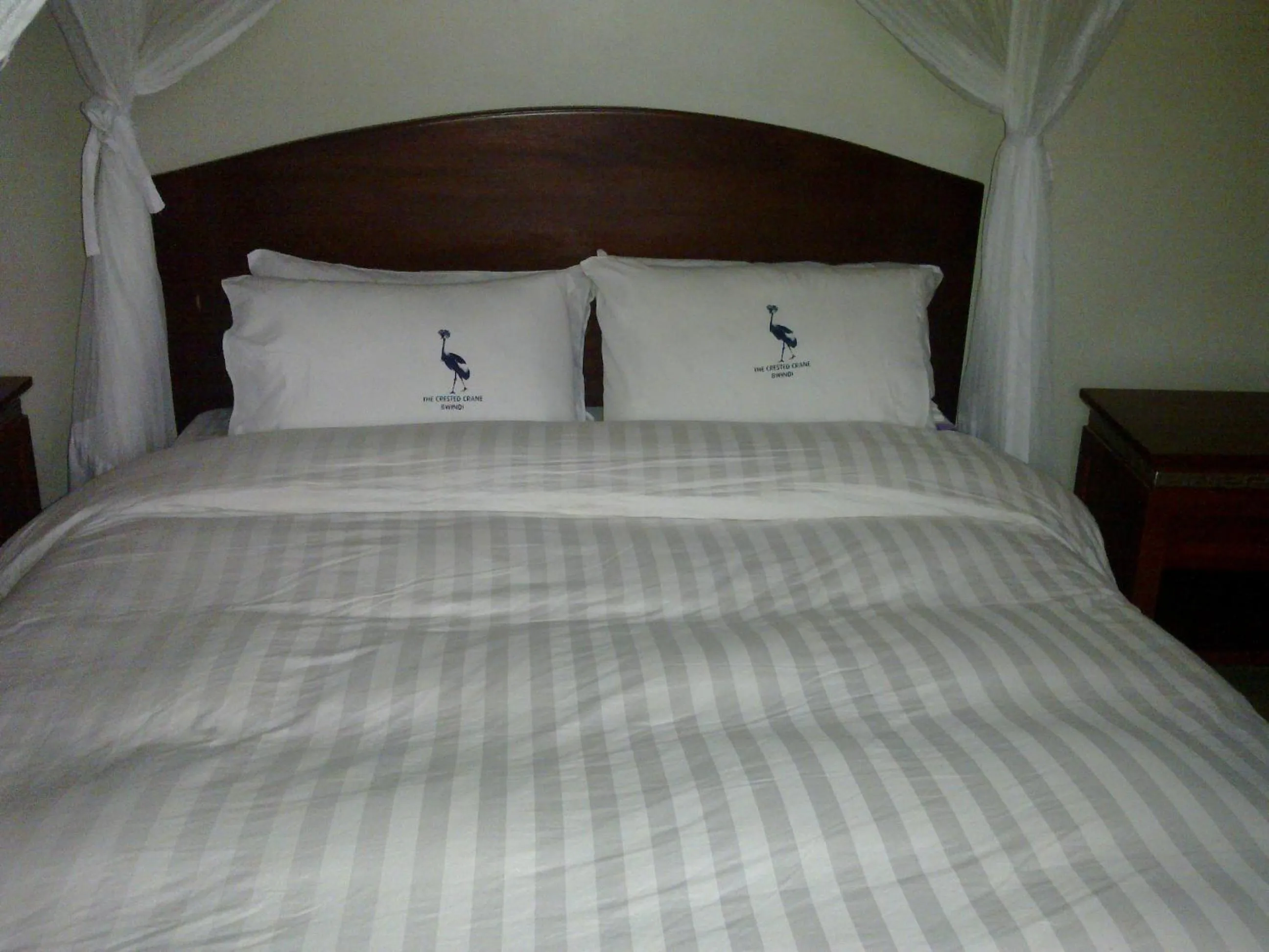 Bed in The Crested Crane Bwindi Hotel