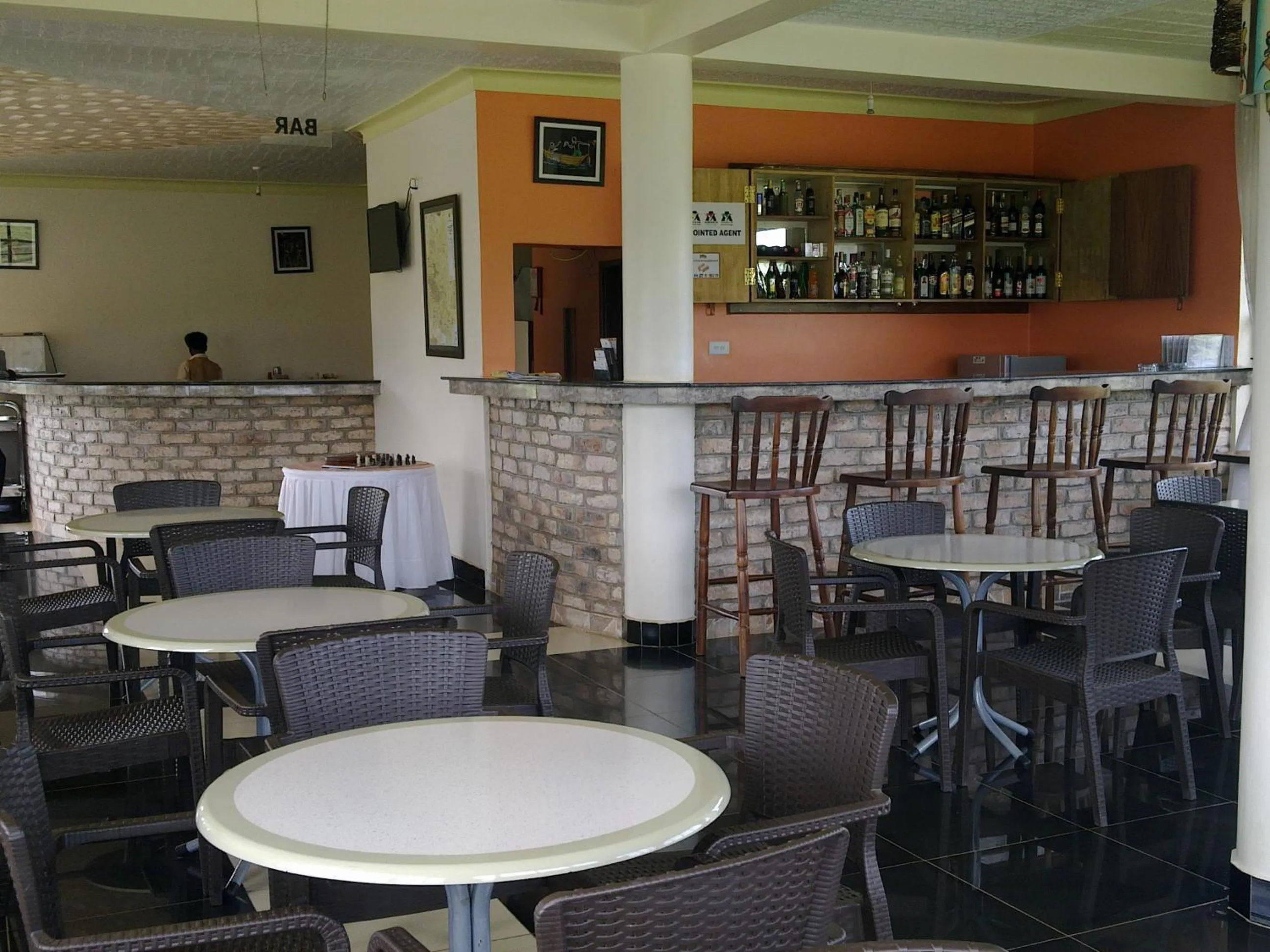 Communal lounge/ TV room in The Crested Crane Bwindi Hotel