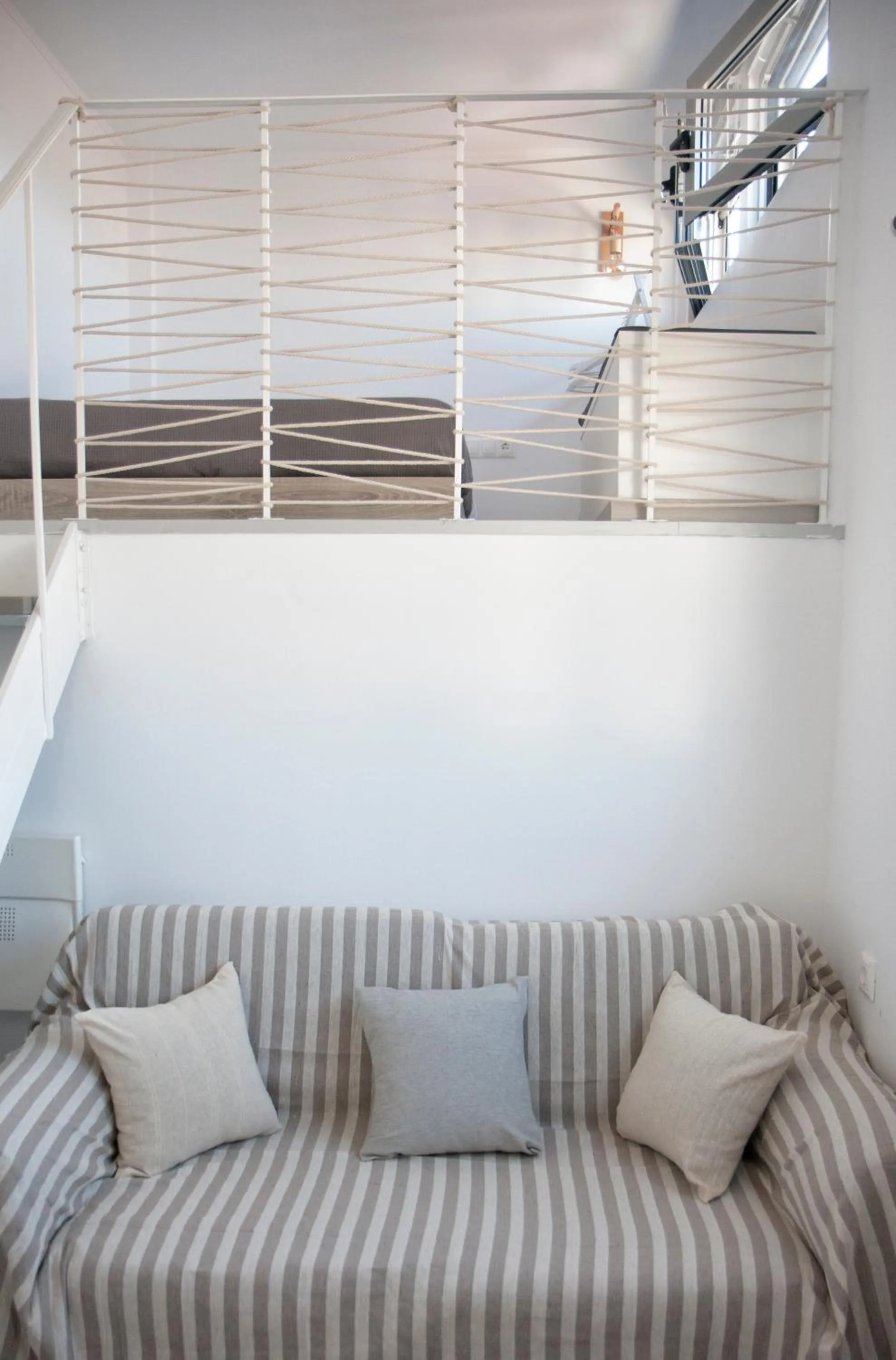 Bed in Axos Apartments