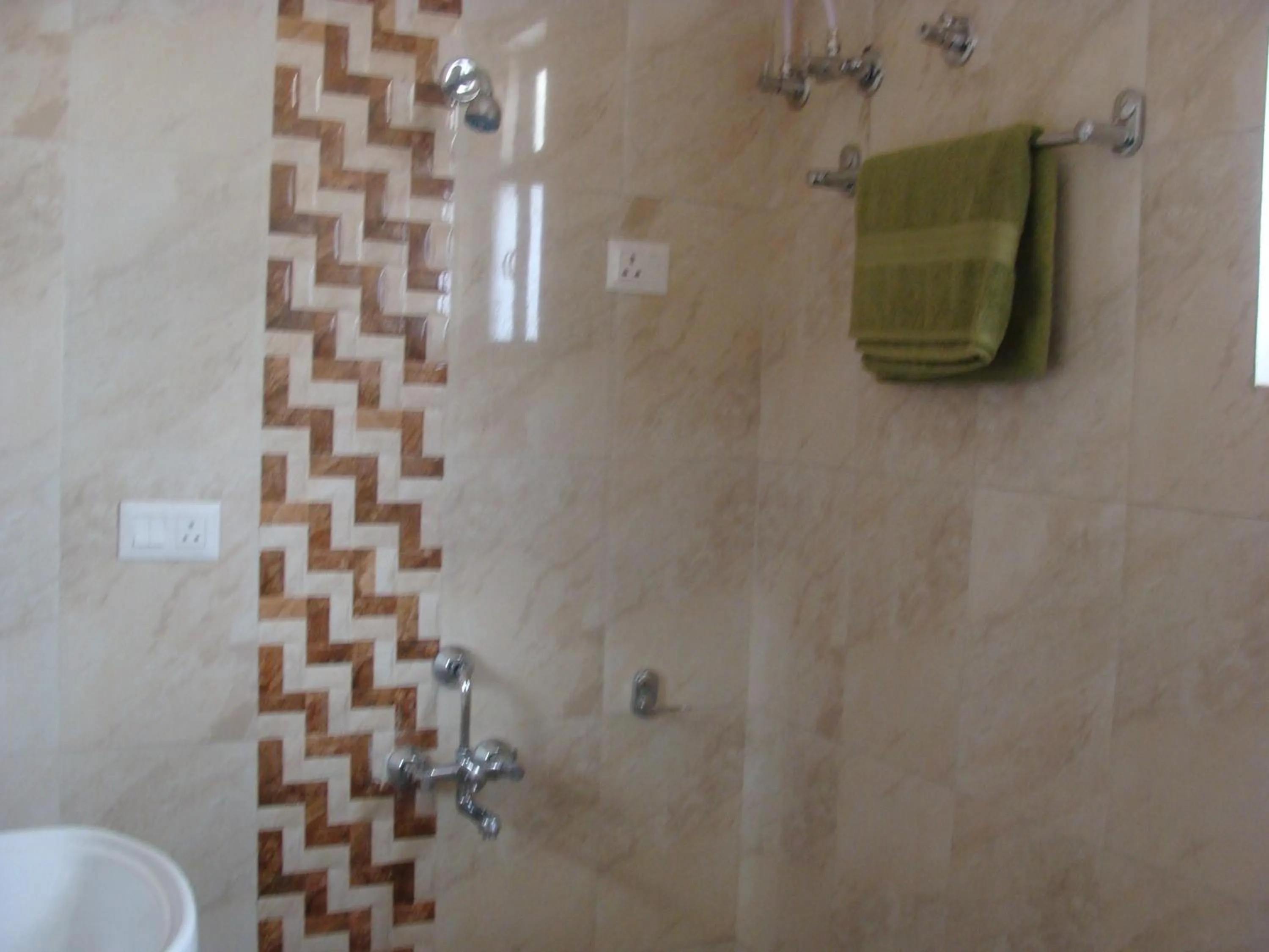 Bathroom in Hotel Abhinandan Grand