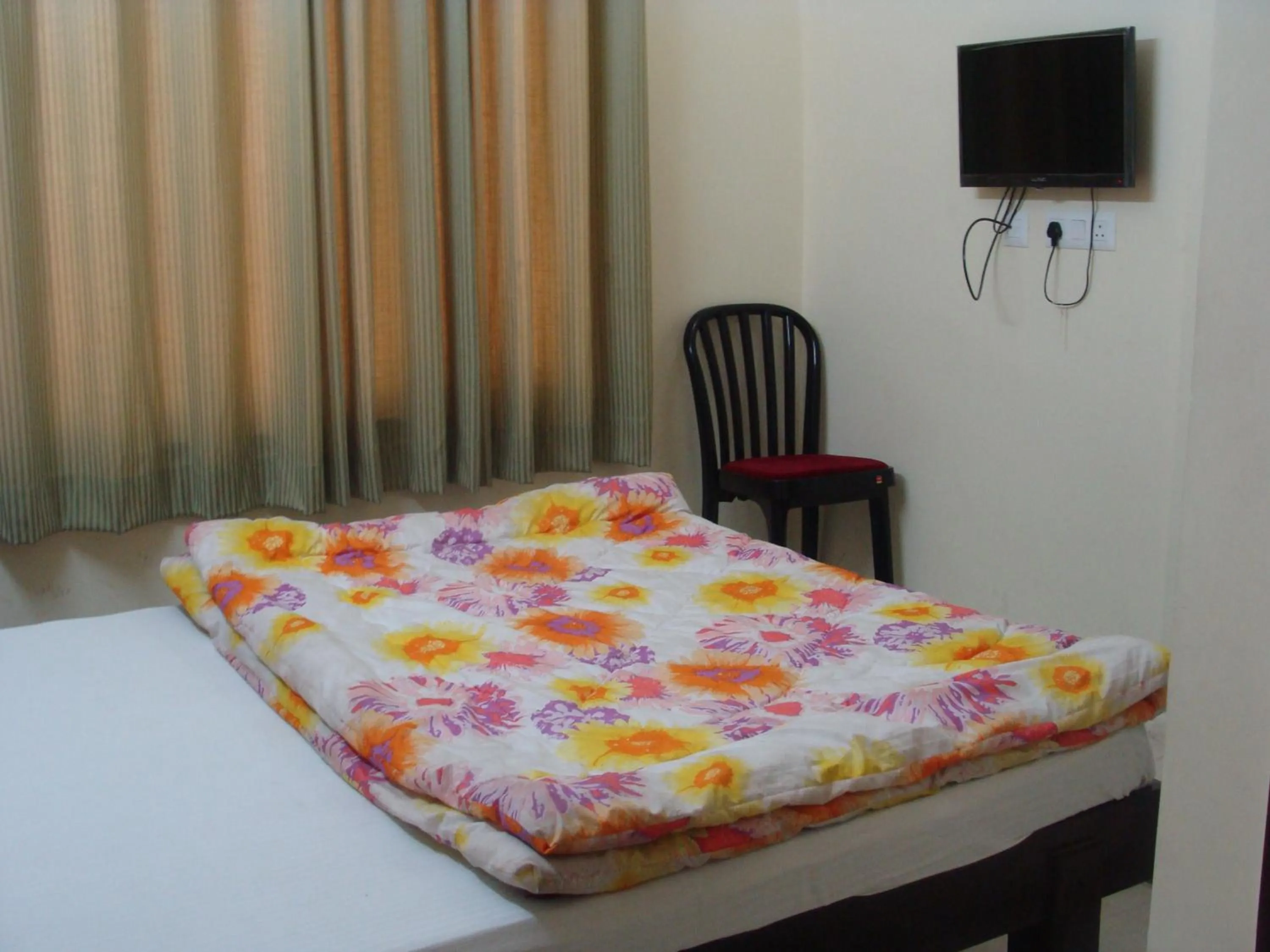 View (from property/room), Bed in Hotel Abhinandan Grand