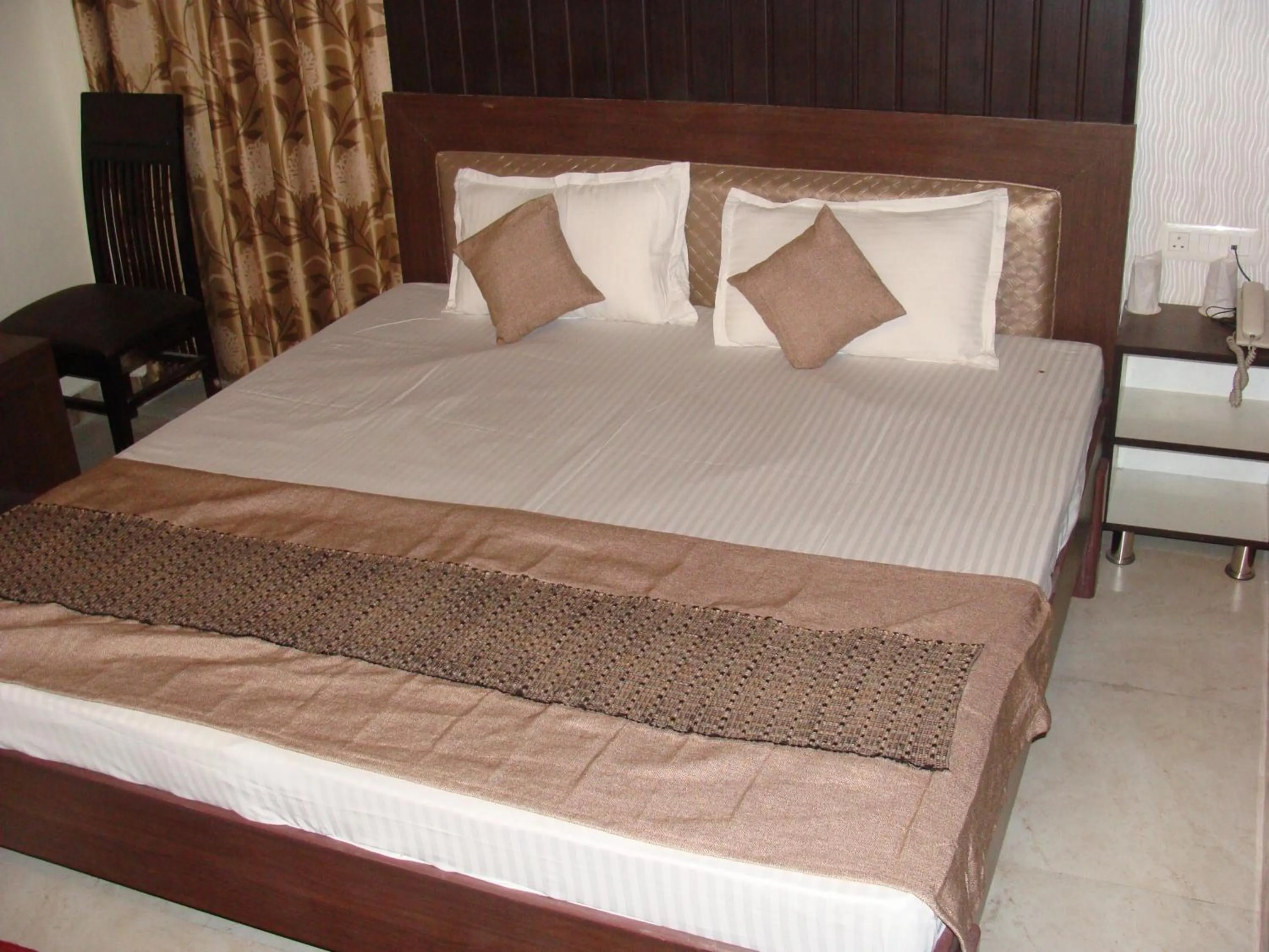 Bedroom, Bed in Hotel Abhinandan Grand