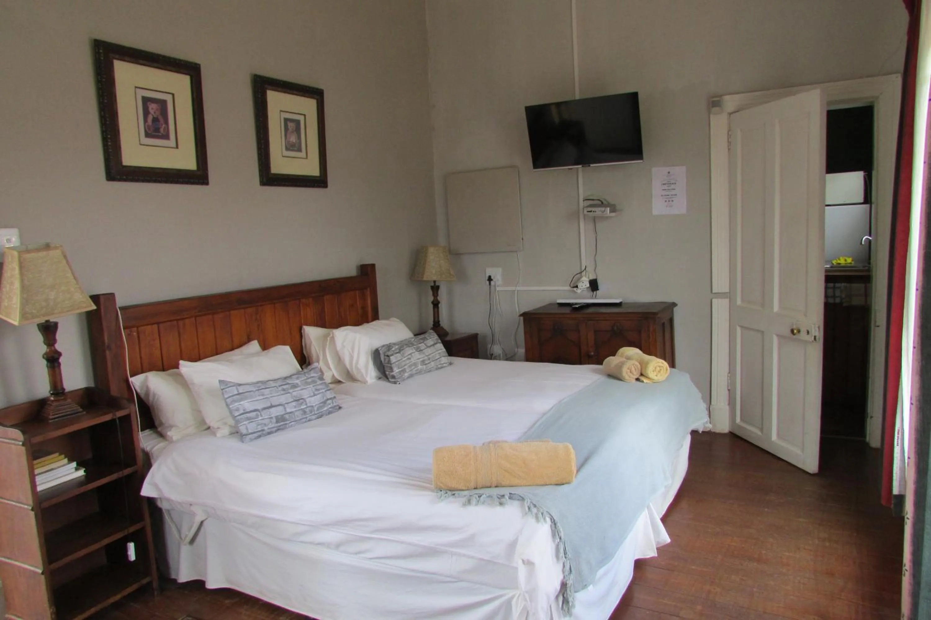 Bed in Absolute Leisure Cottages