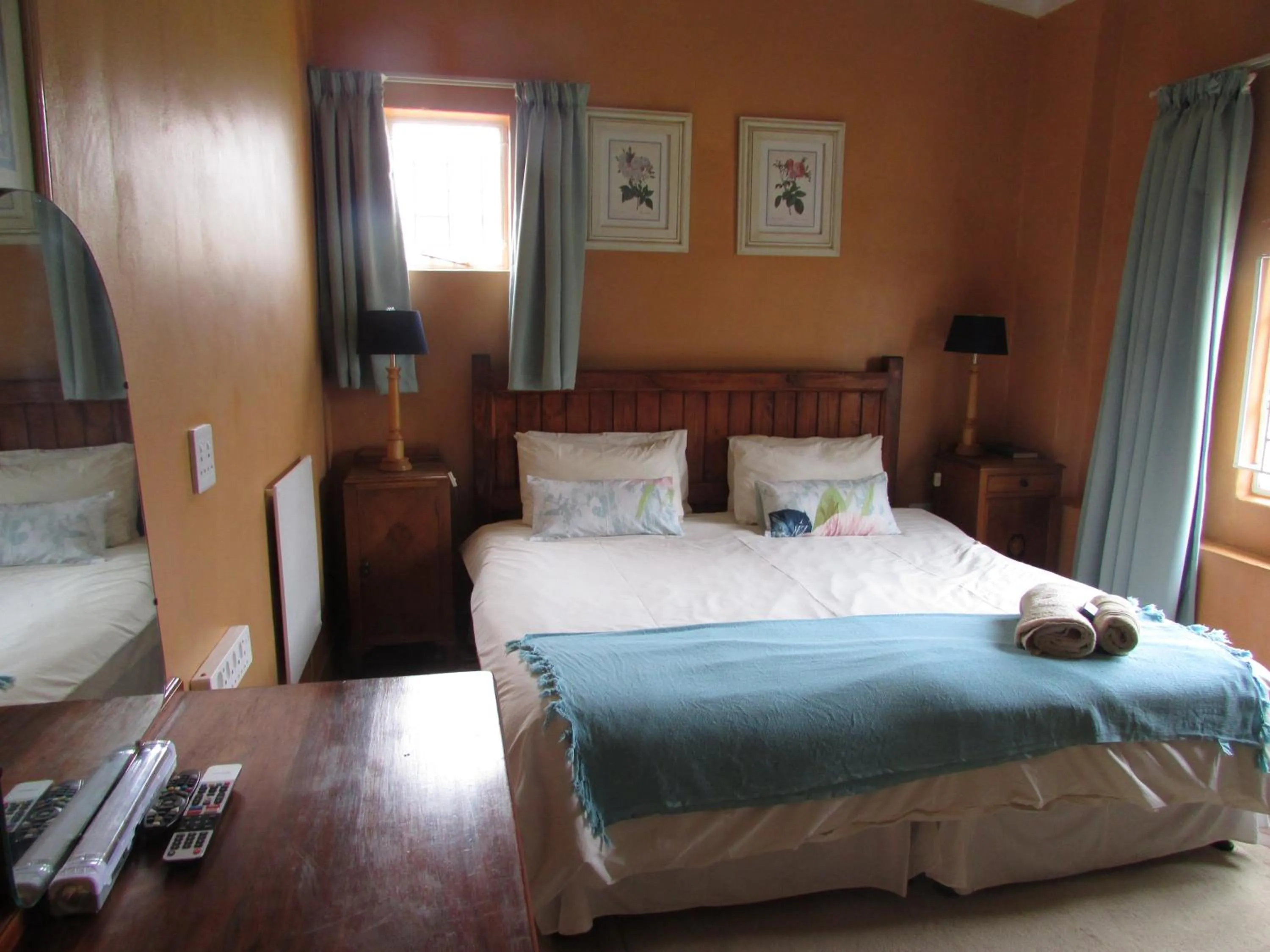 Bedroom, Bed in Absolute Leisure Cottages