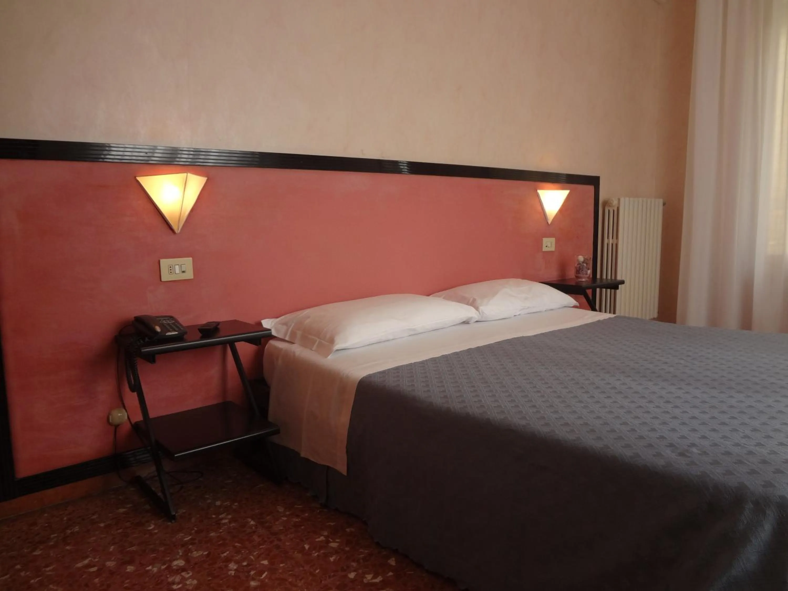 Bedroom in Hotel Nettuno