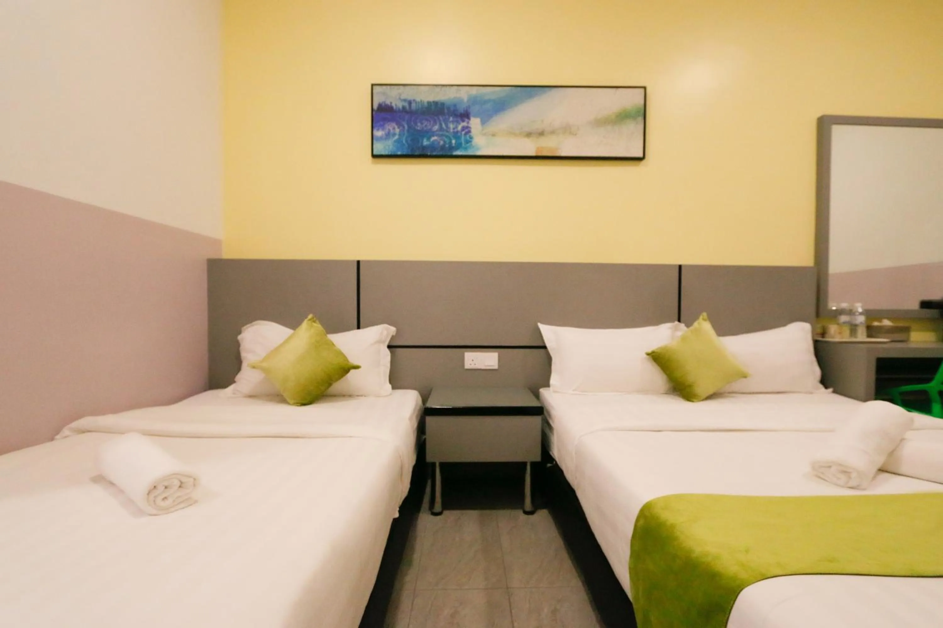 Bed in Travelland Hotel