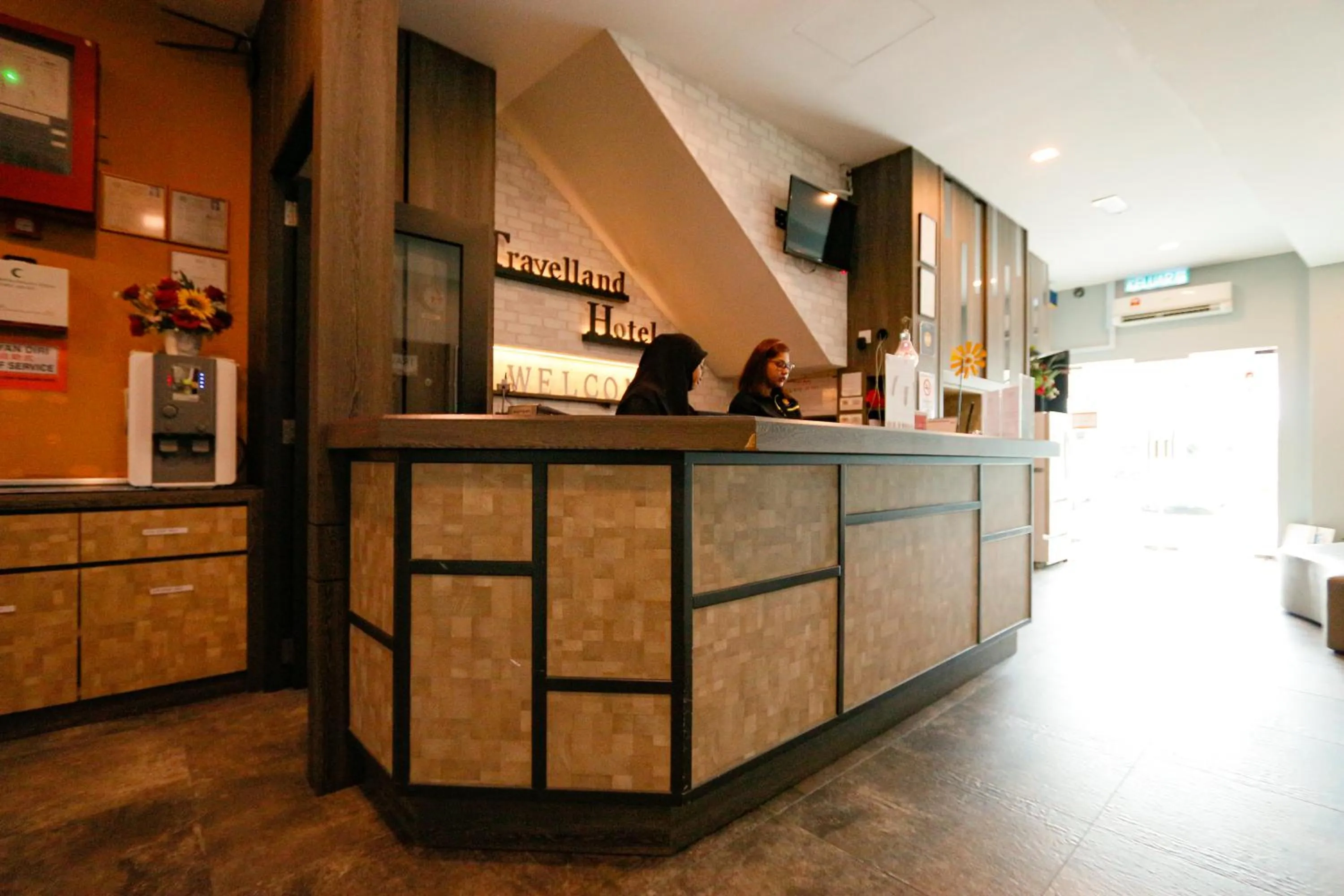 Lobby or reception in Travelland Hotel