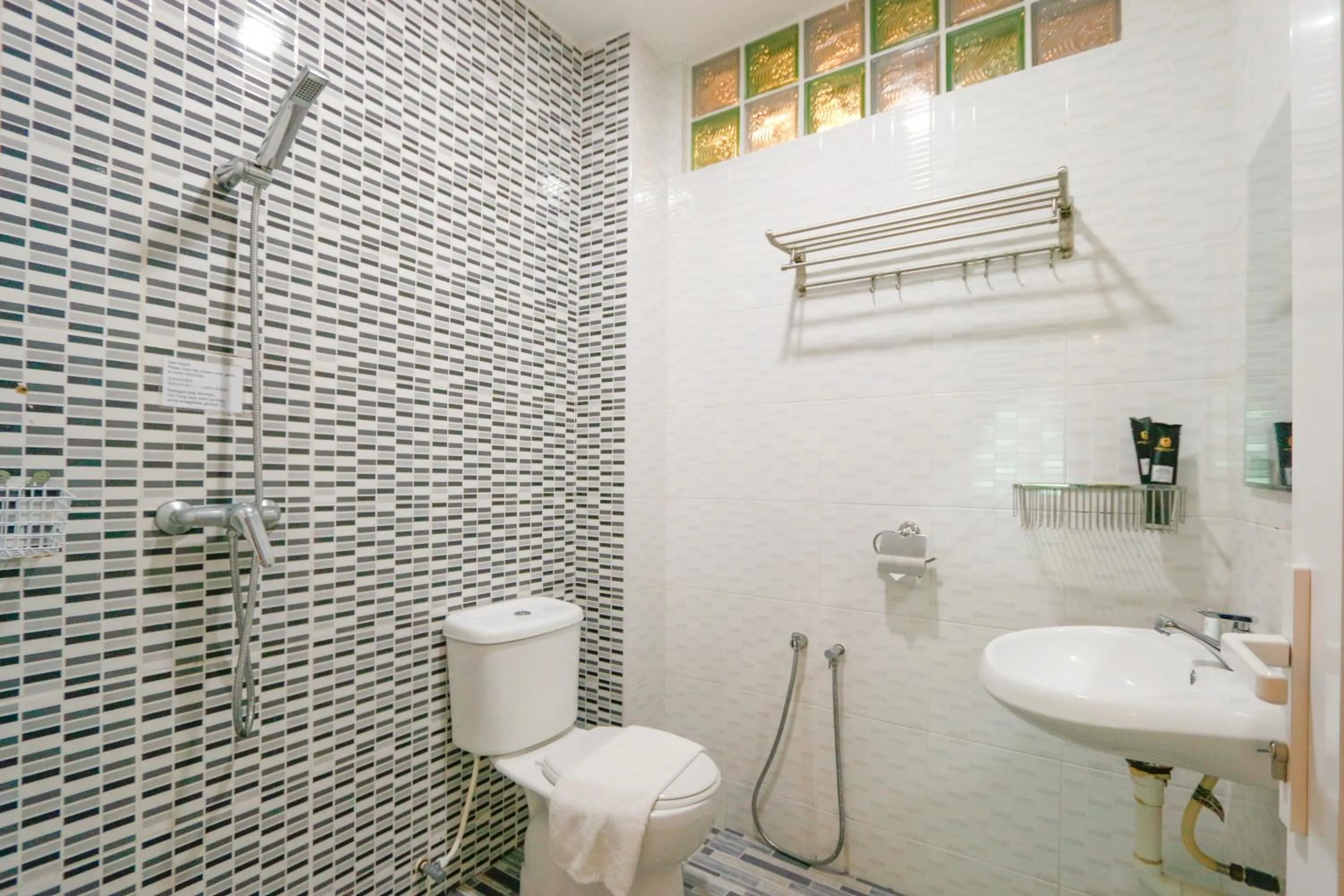 Shower in Travelland Hotel