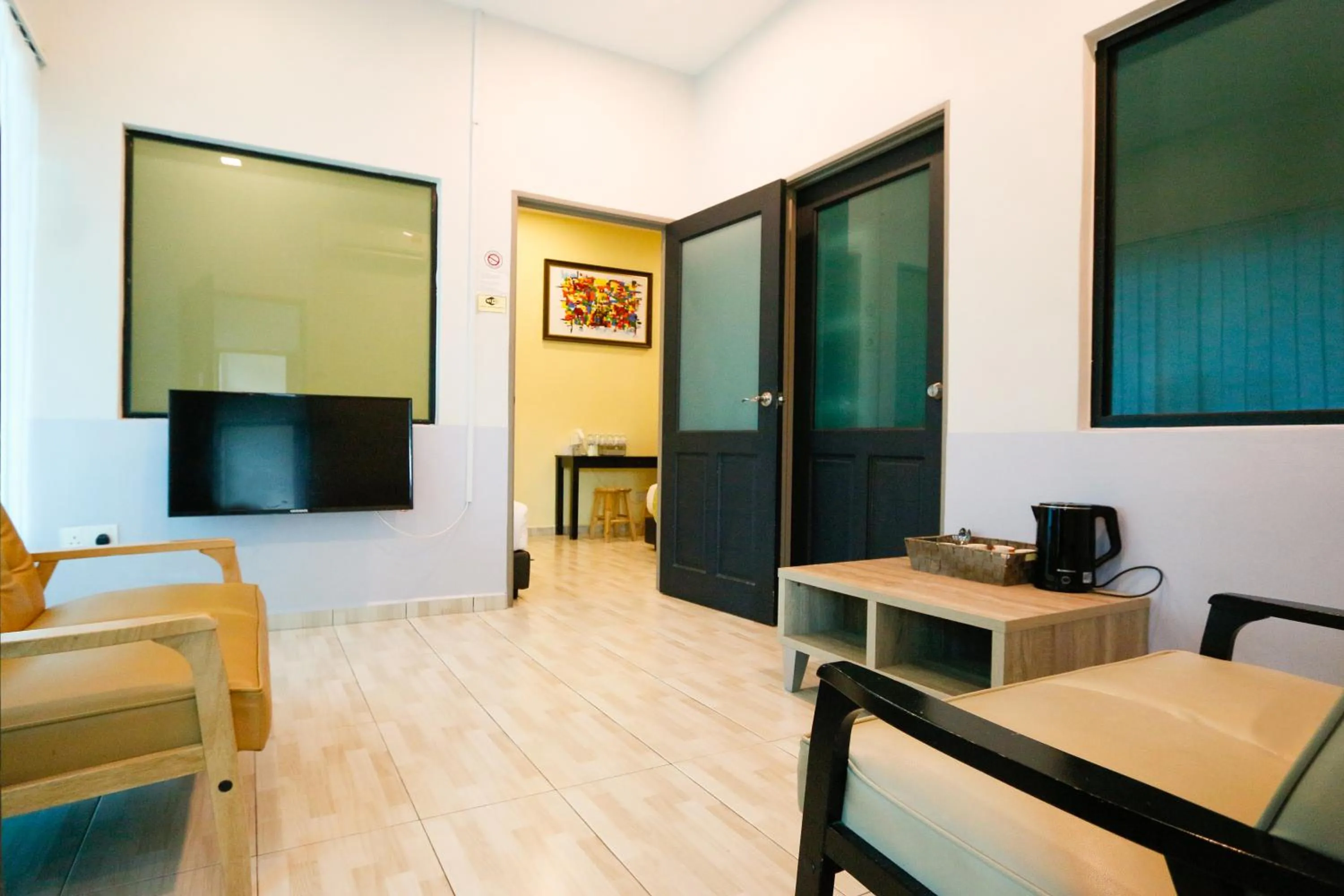 Living room in Travelland Hotel