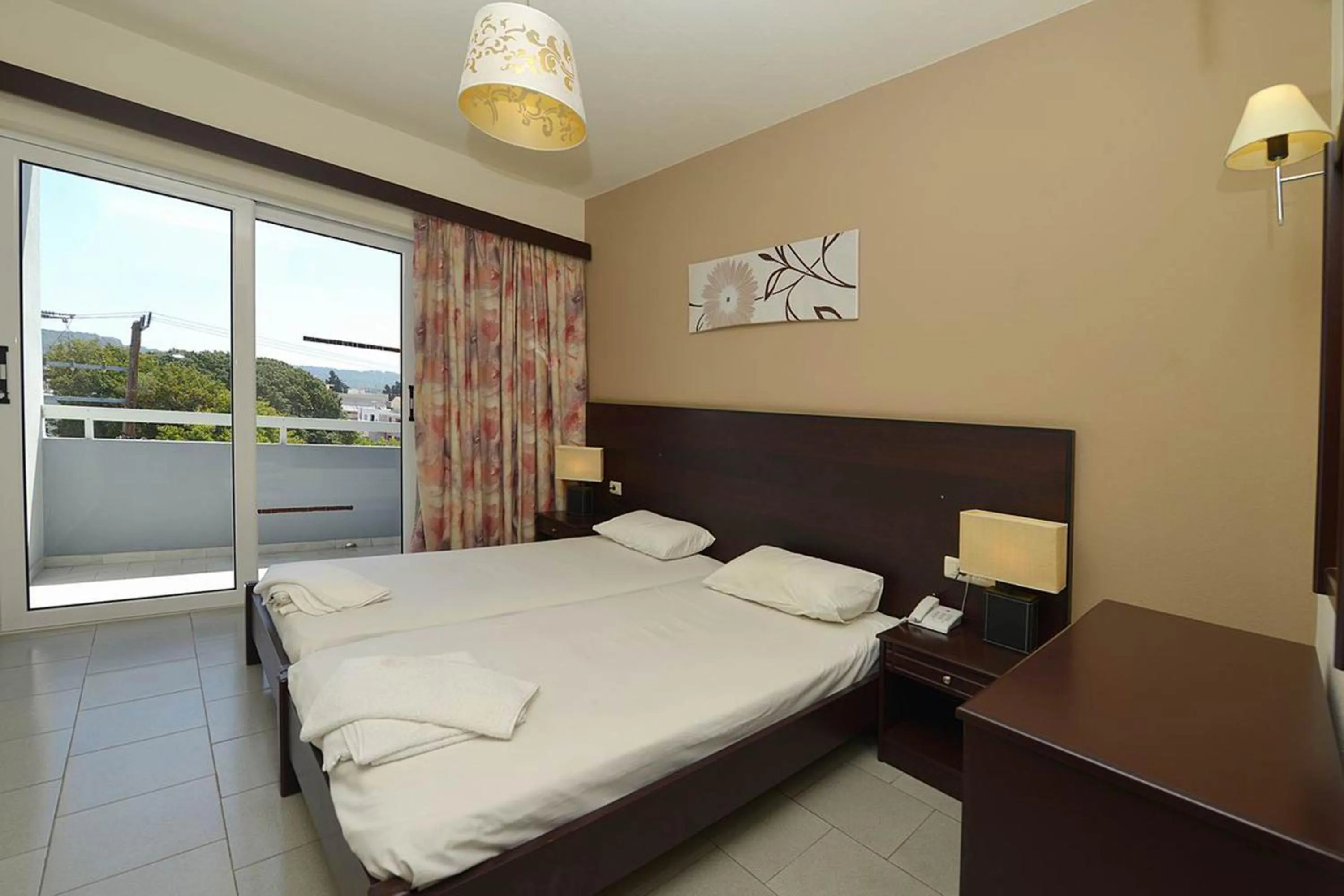 Bedroom in Ialysos City Hotel