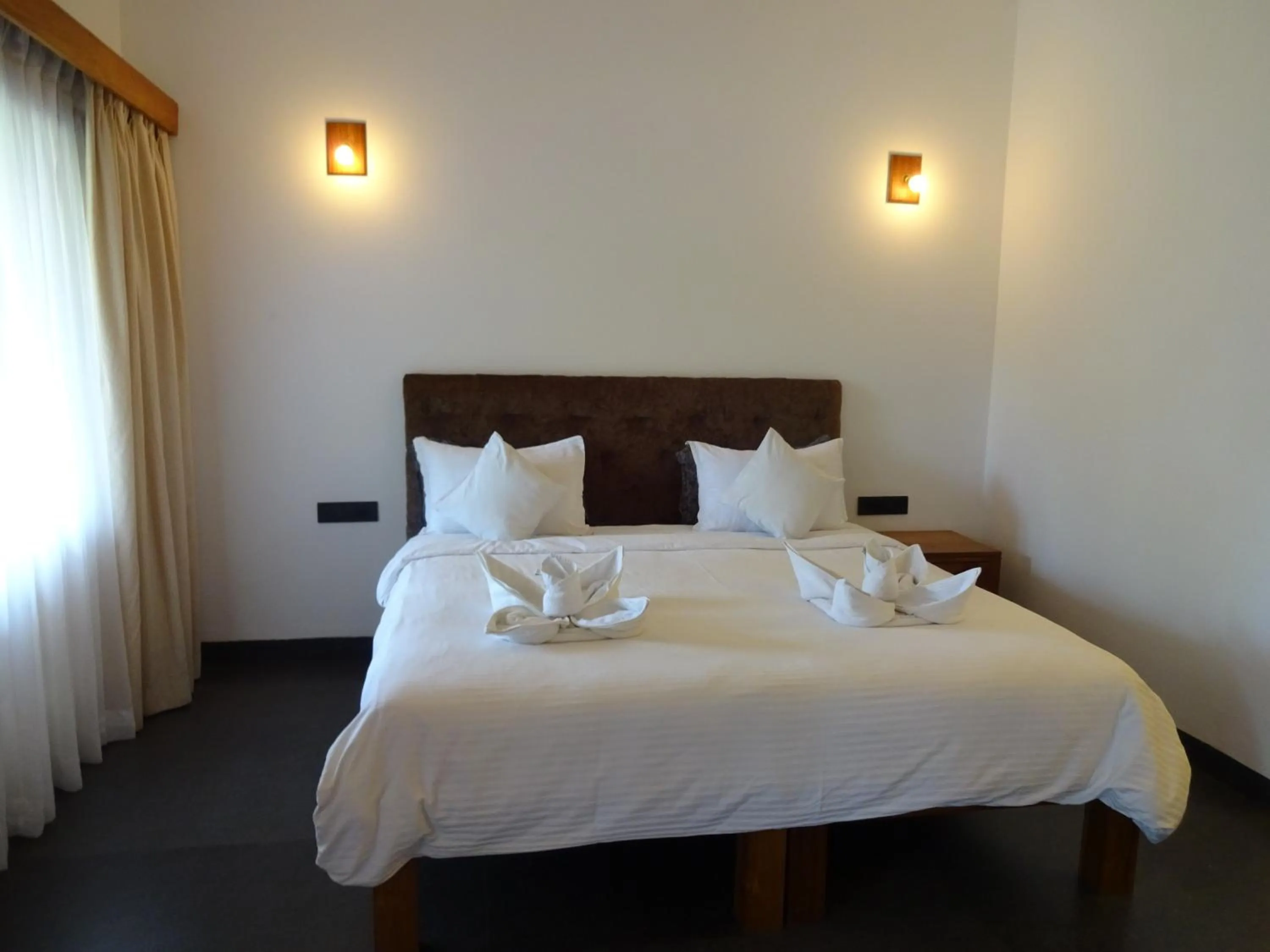 Bed in Dunhill Beach Resort