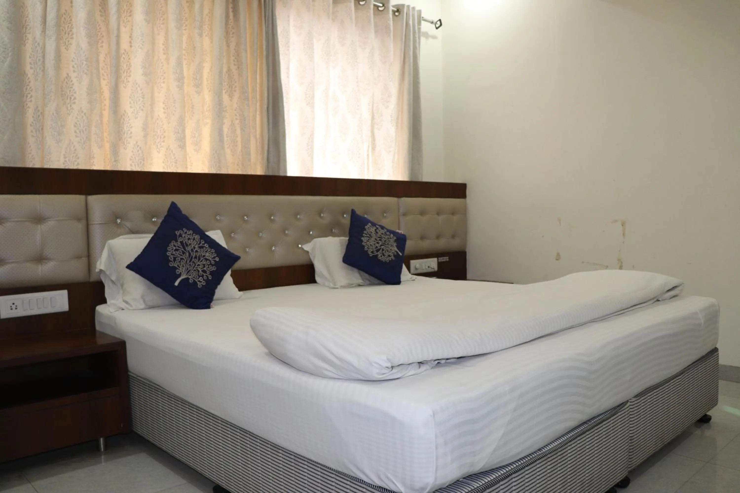 Bed in Hotel Sai Shubham