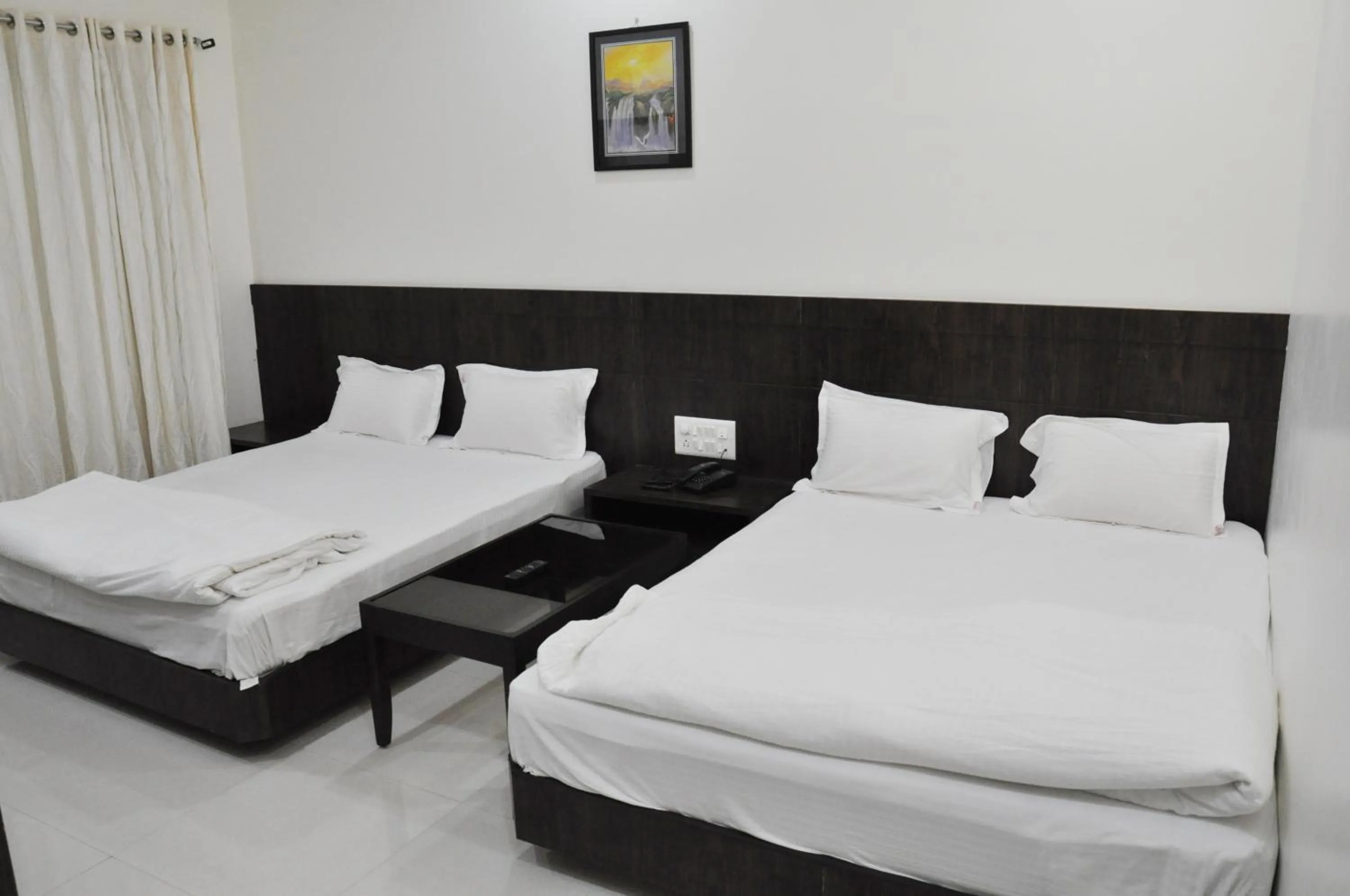 Bed in Hotel Sai Shubham