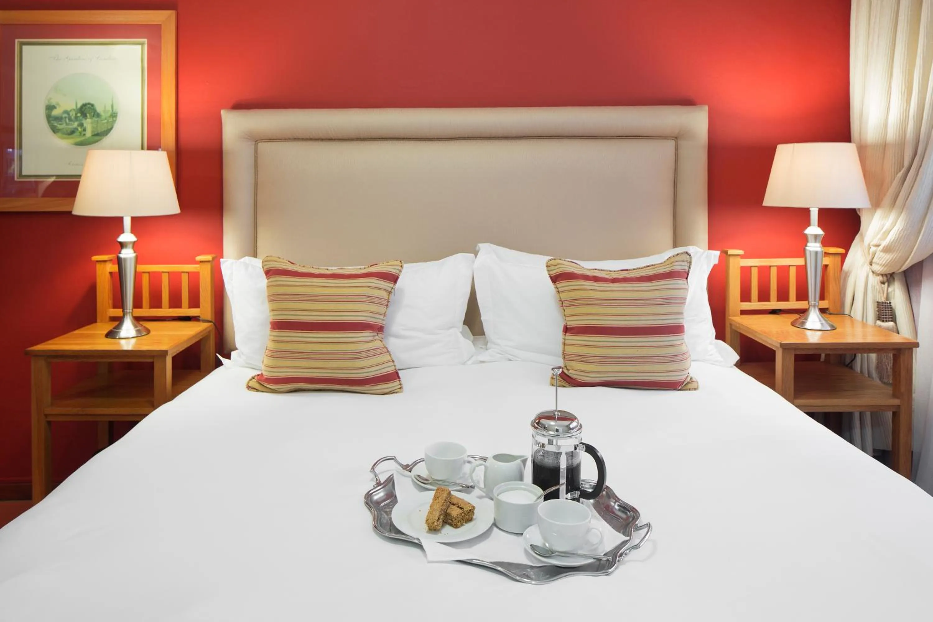 Bed in Kingfisher GuestHouse