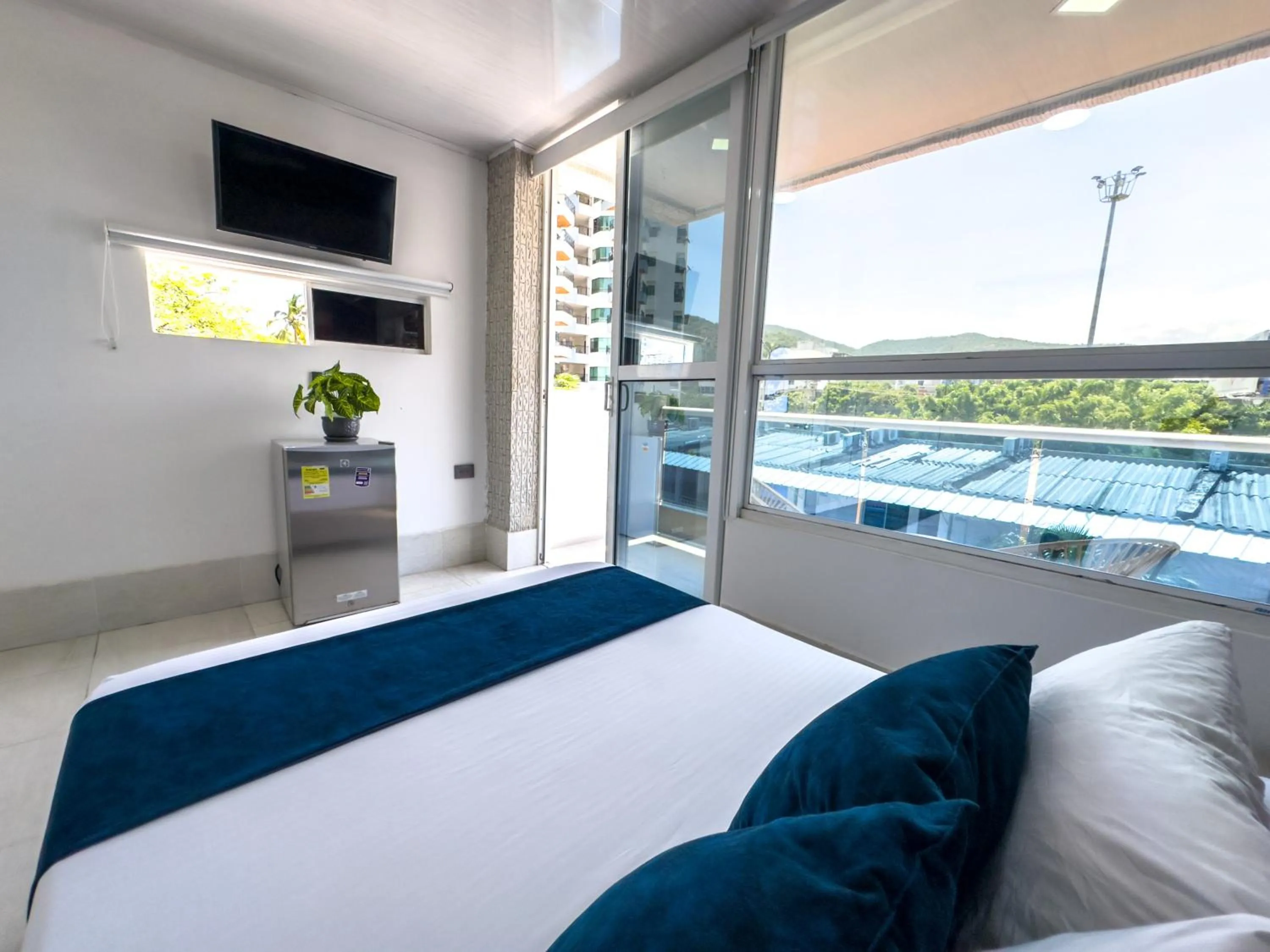 View (from property/room), Bed in Hotel Bello Caribe Rodadero