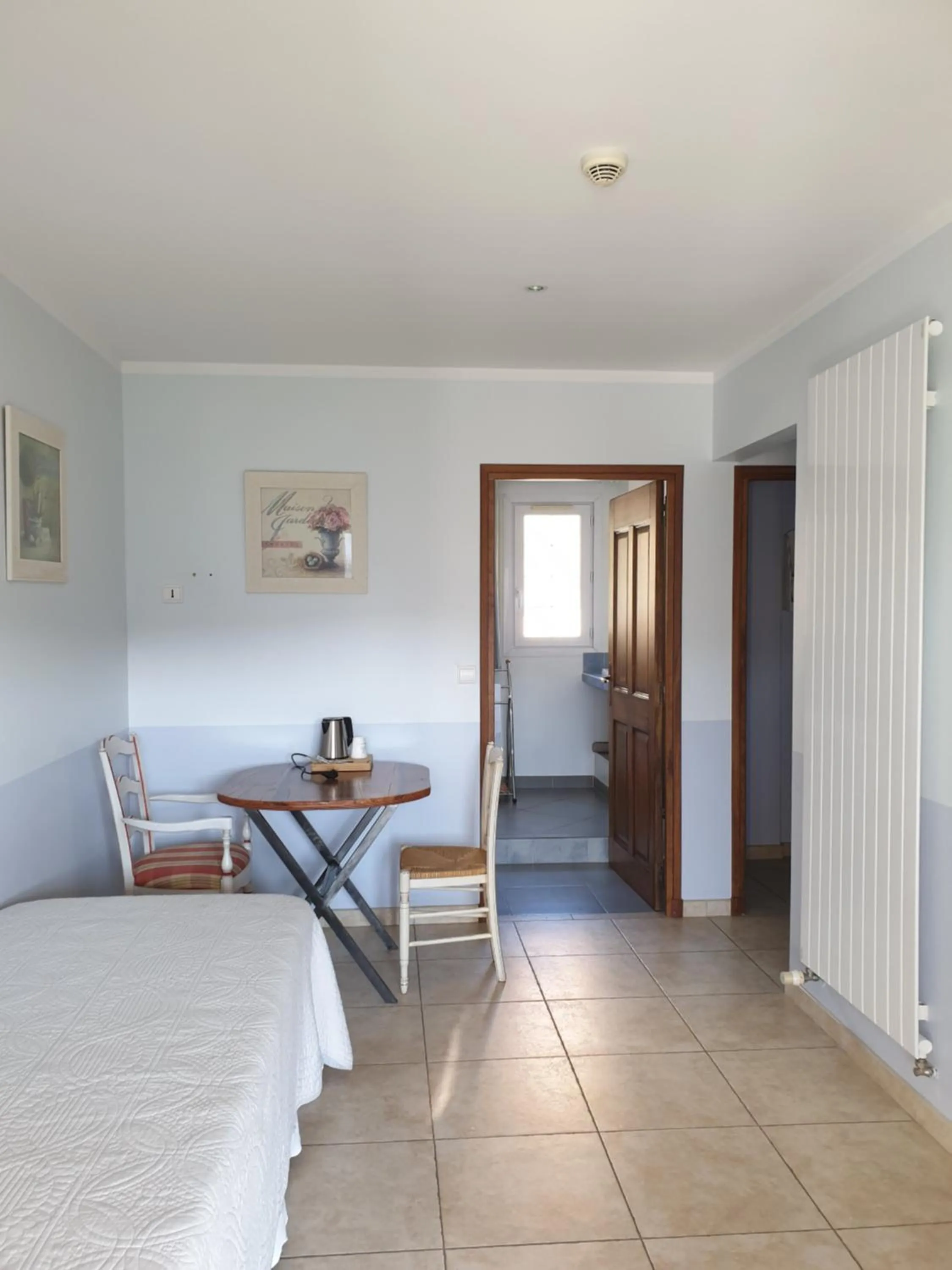 Living room, Bed in Au Relais Provencal
