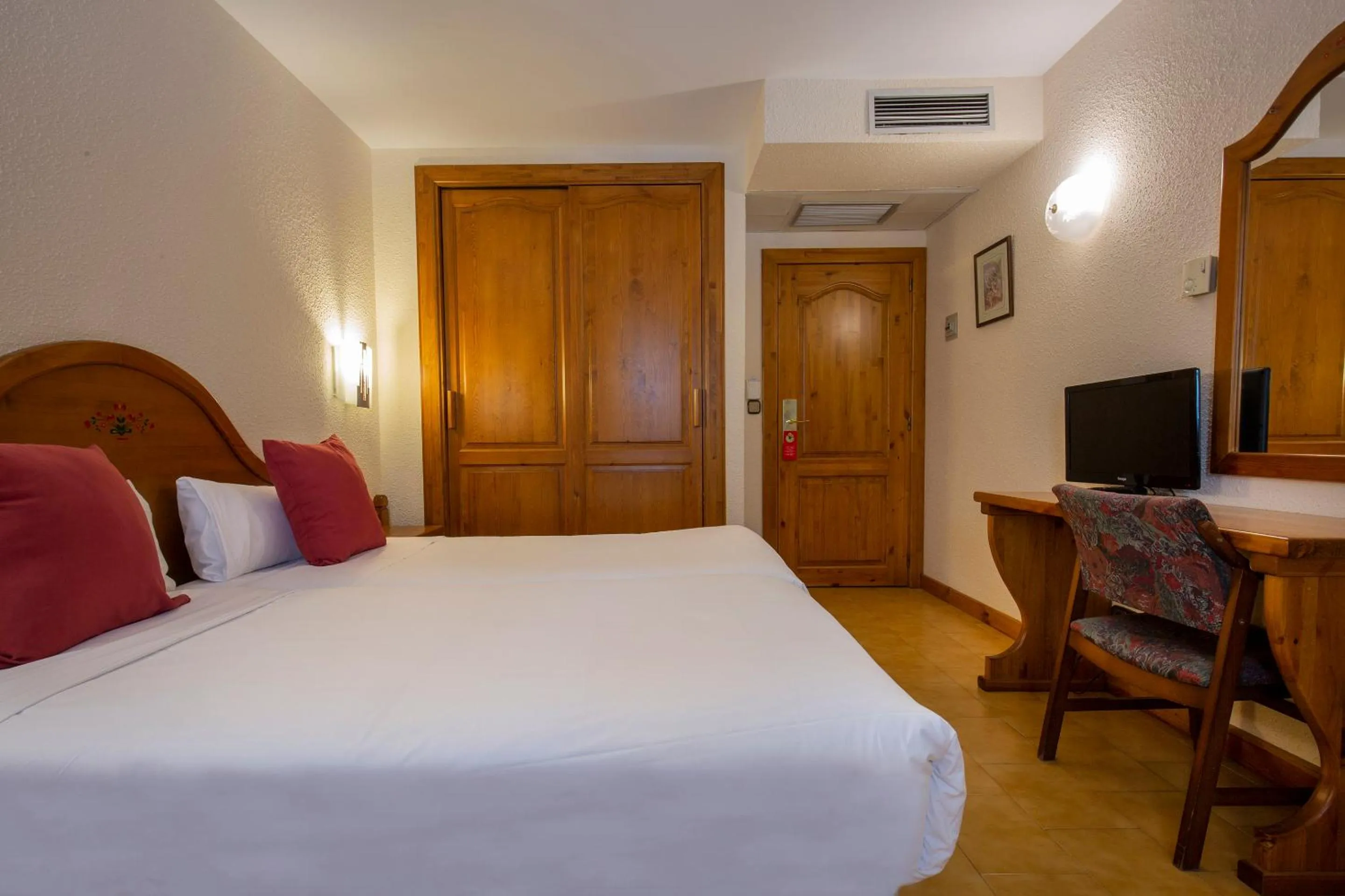 wardrobe, Bed in Hotel Sant Gothard by Nexta