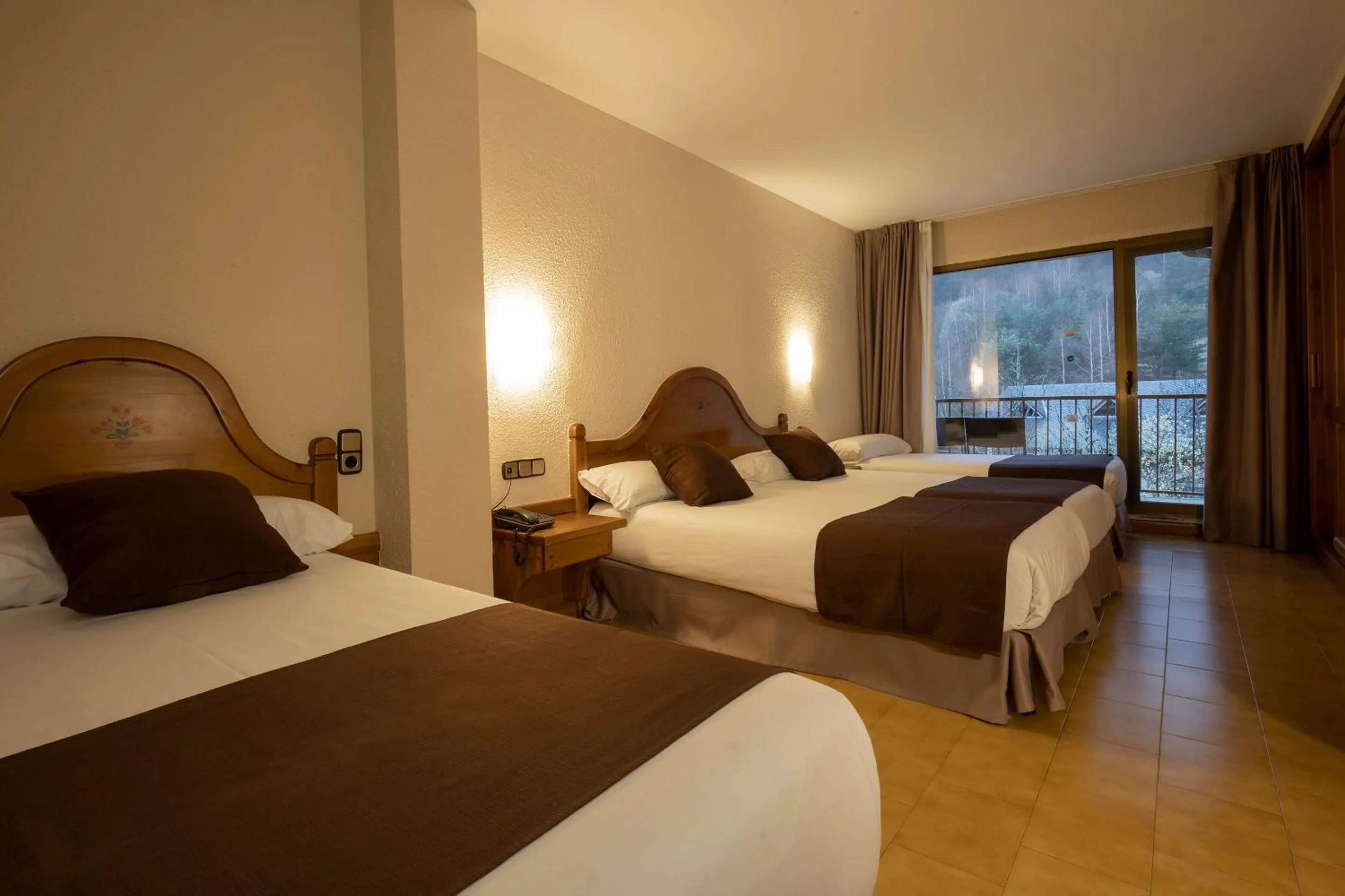 Bed in Hotel Sant Gothard by Nexta