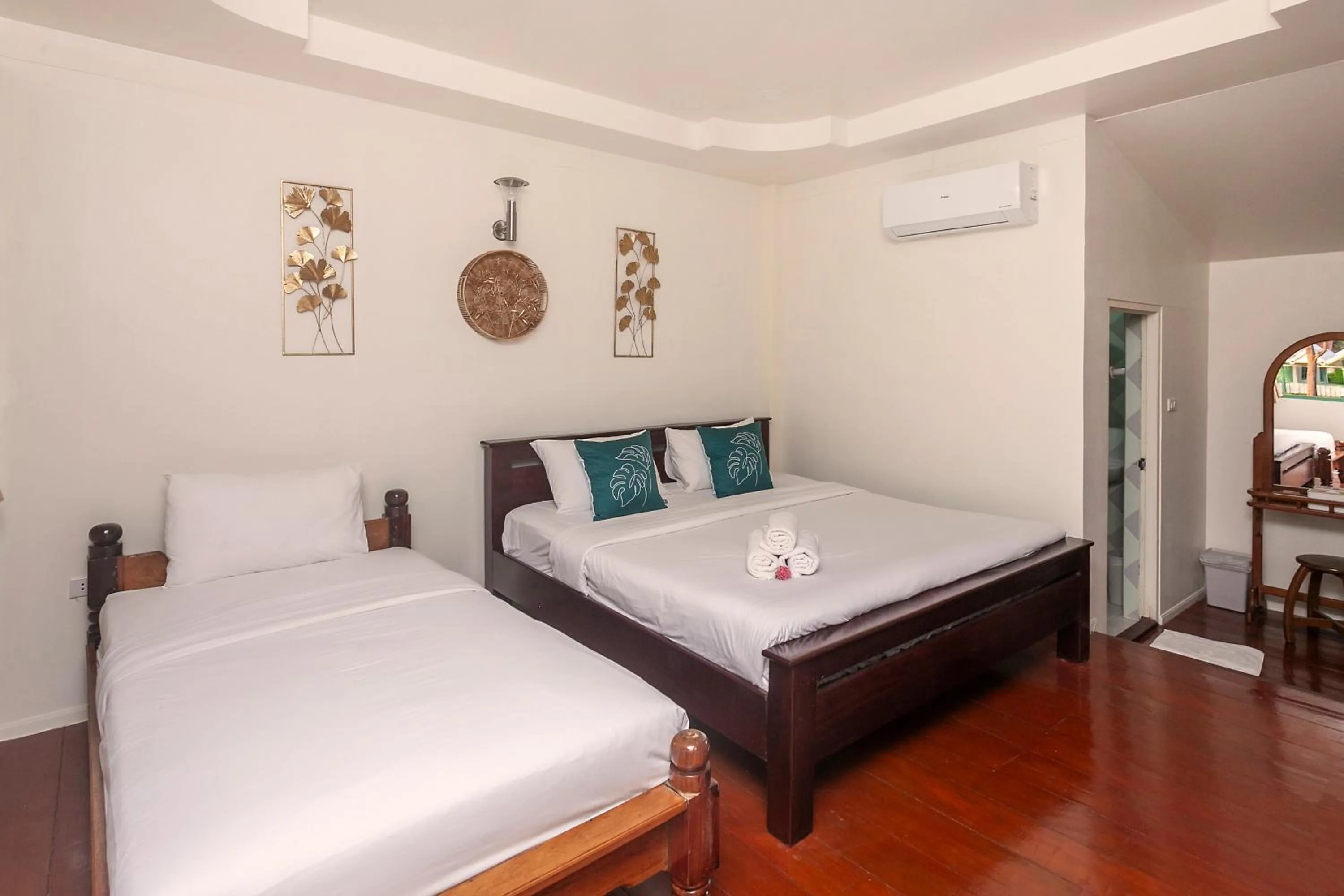 Bed in Baanpufa Resort