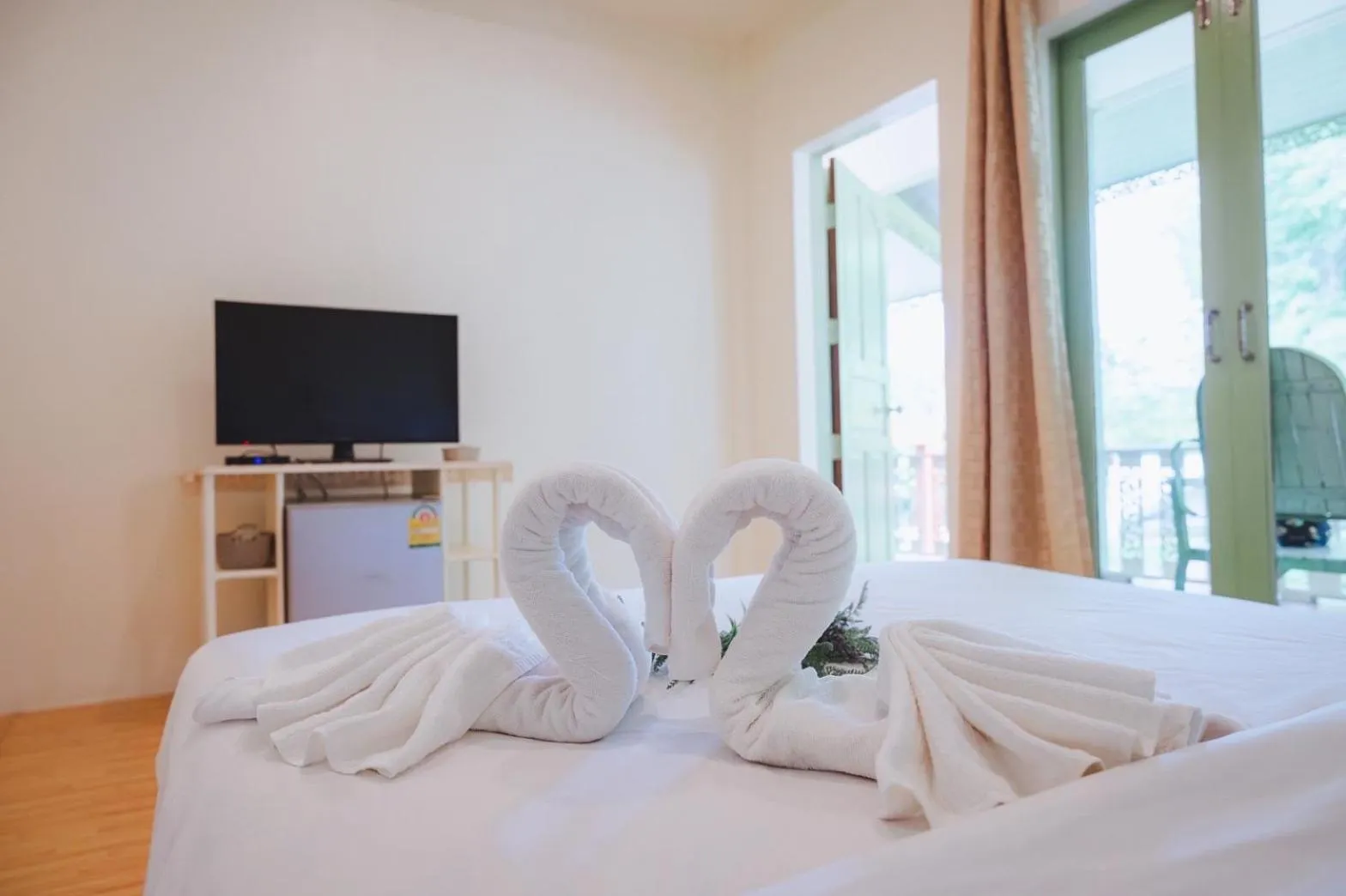 Bed in Baanpufa Resort