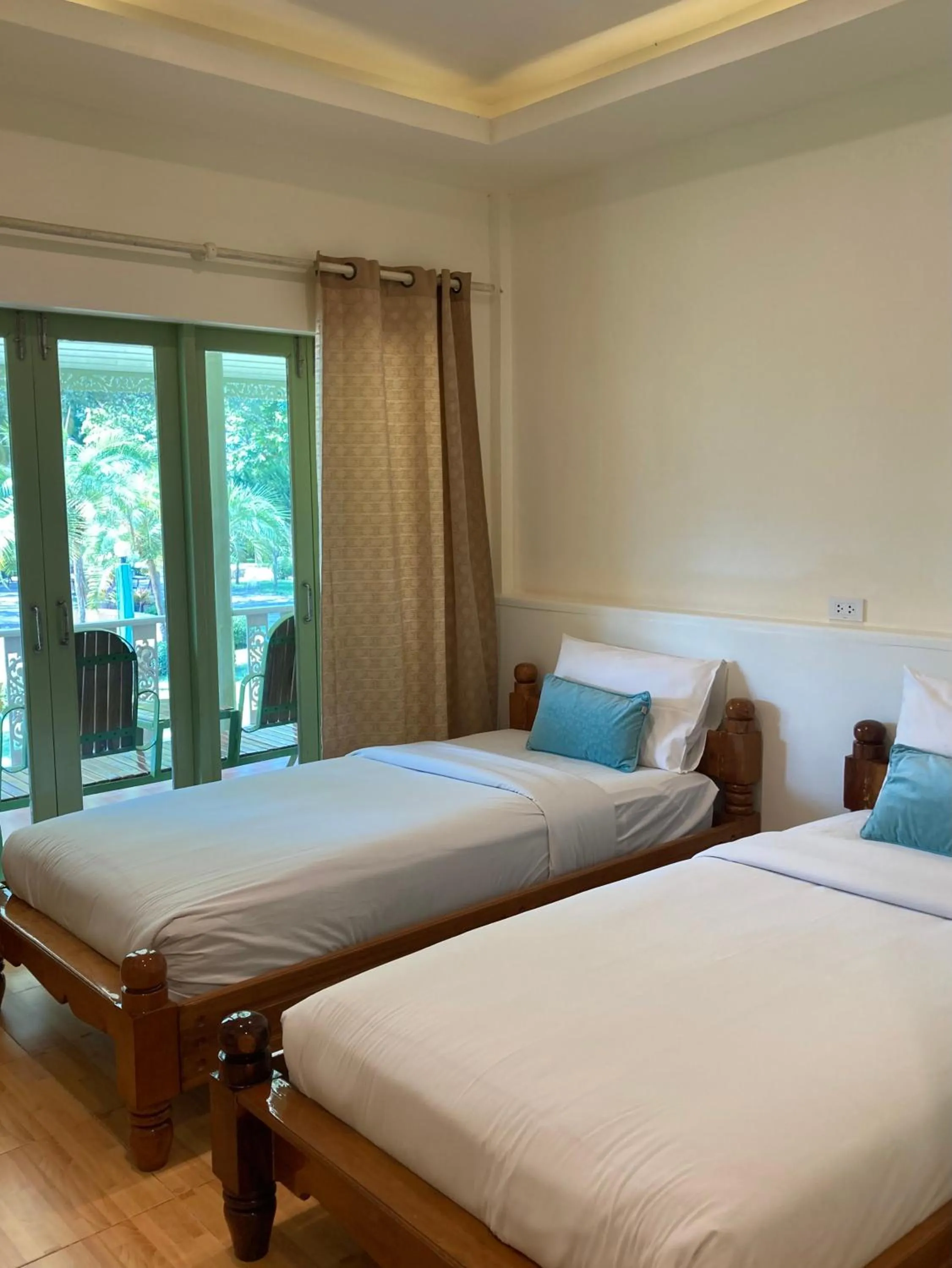 Bed in Baanpufa Resort