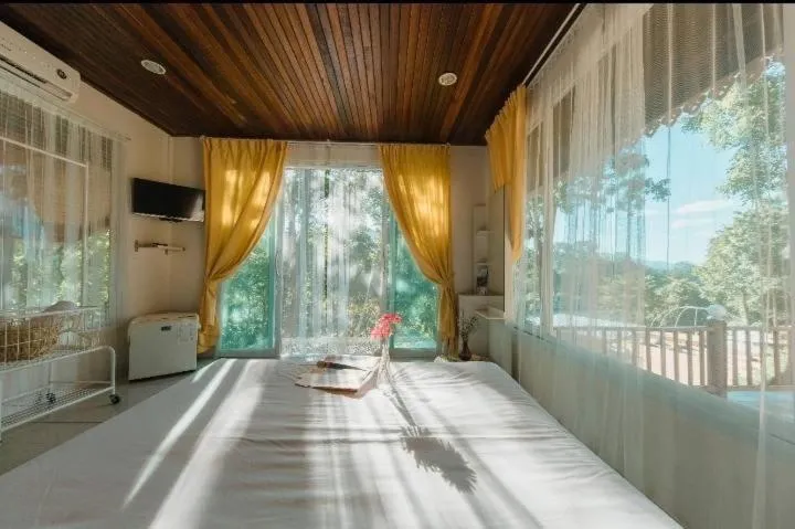 Bed in Baanpufa Resort