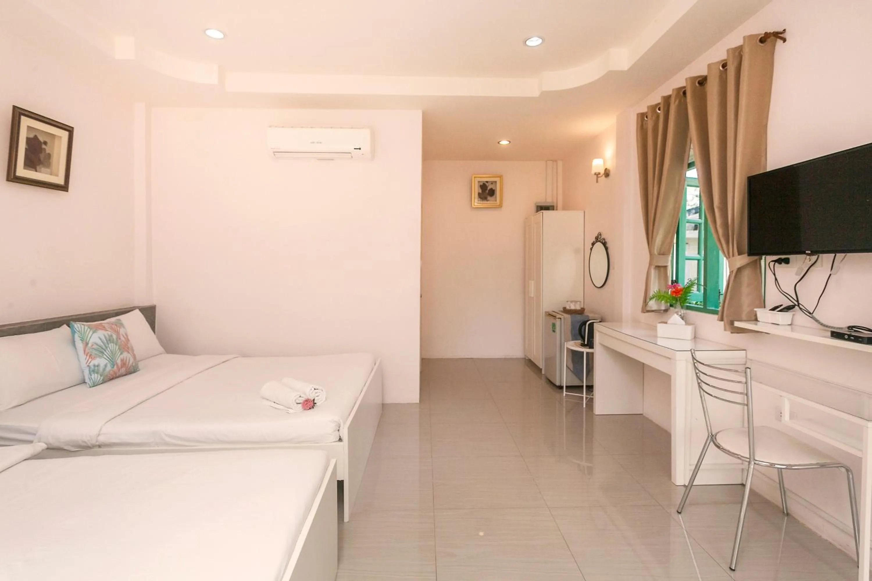 Bed in Baanpufa Resort