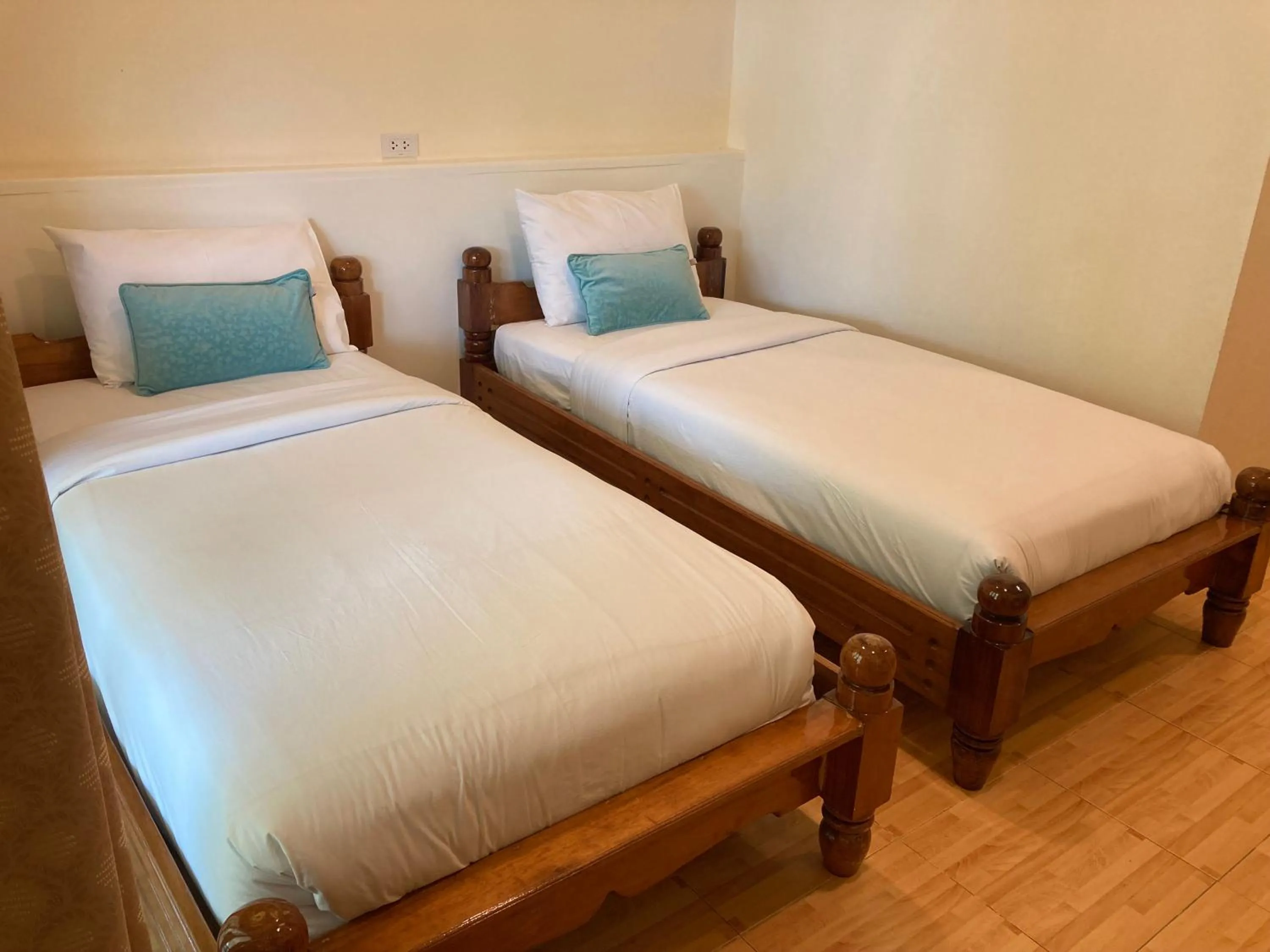 Bed in Baanpufa Resort