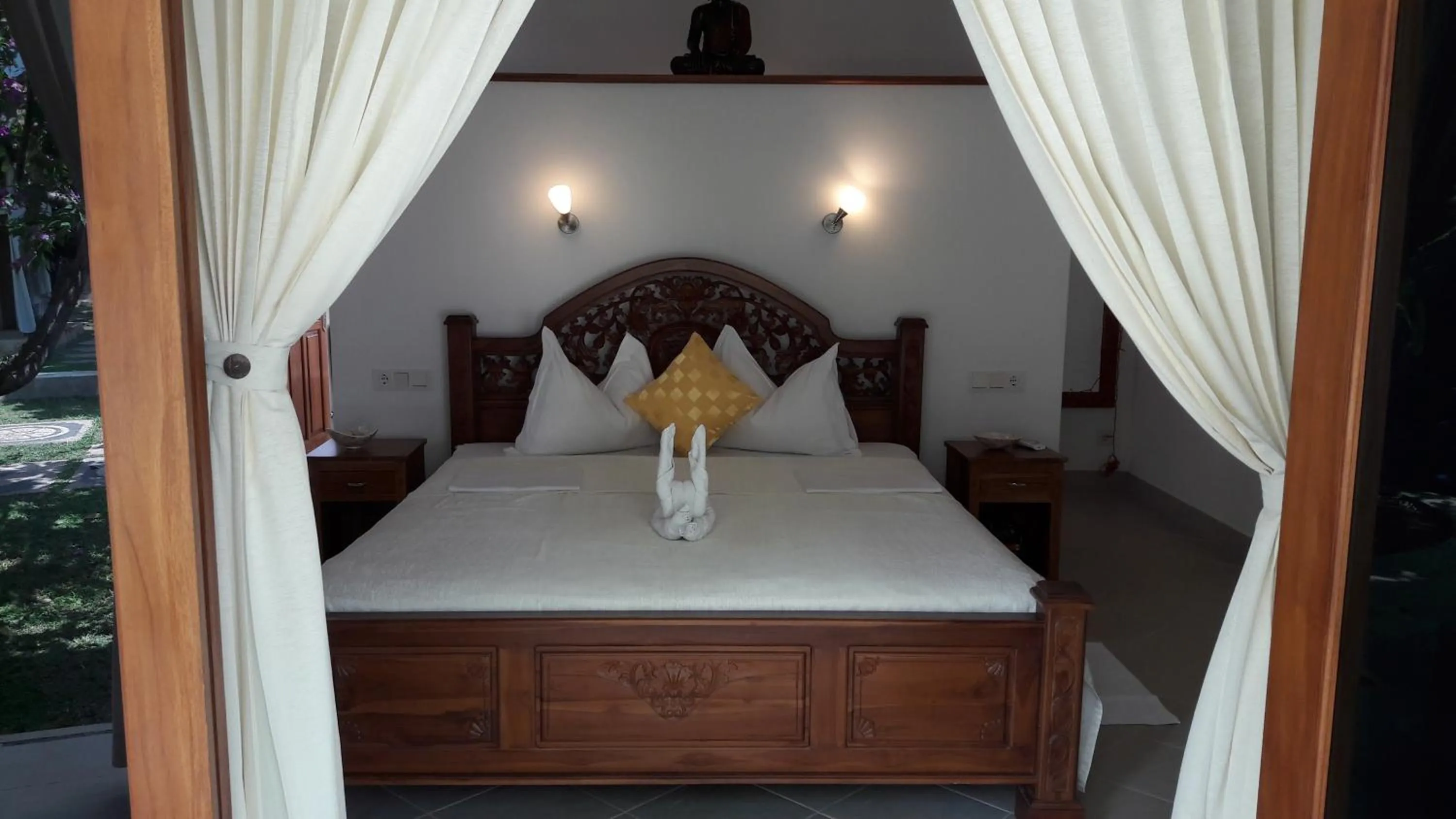Bed in Villa Jakaranda and Villa Marakuya